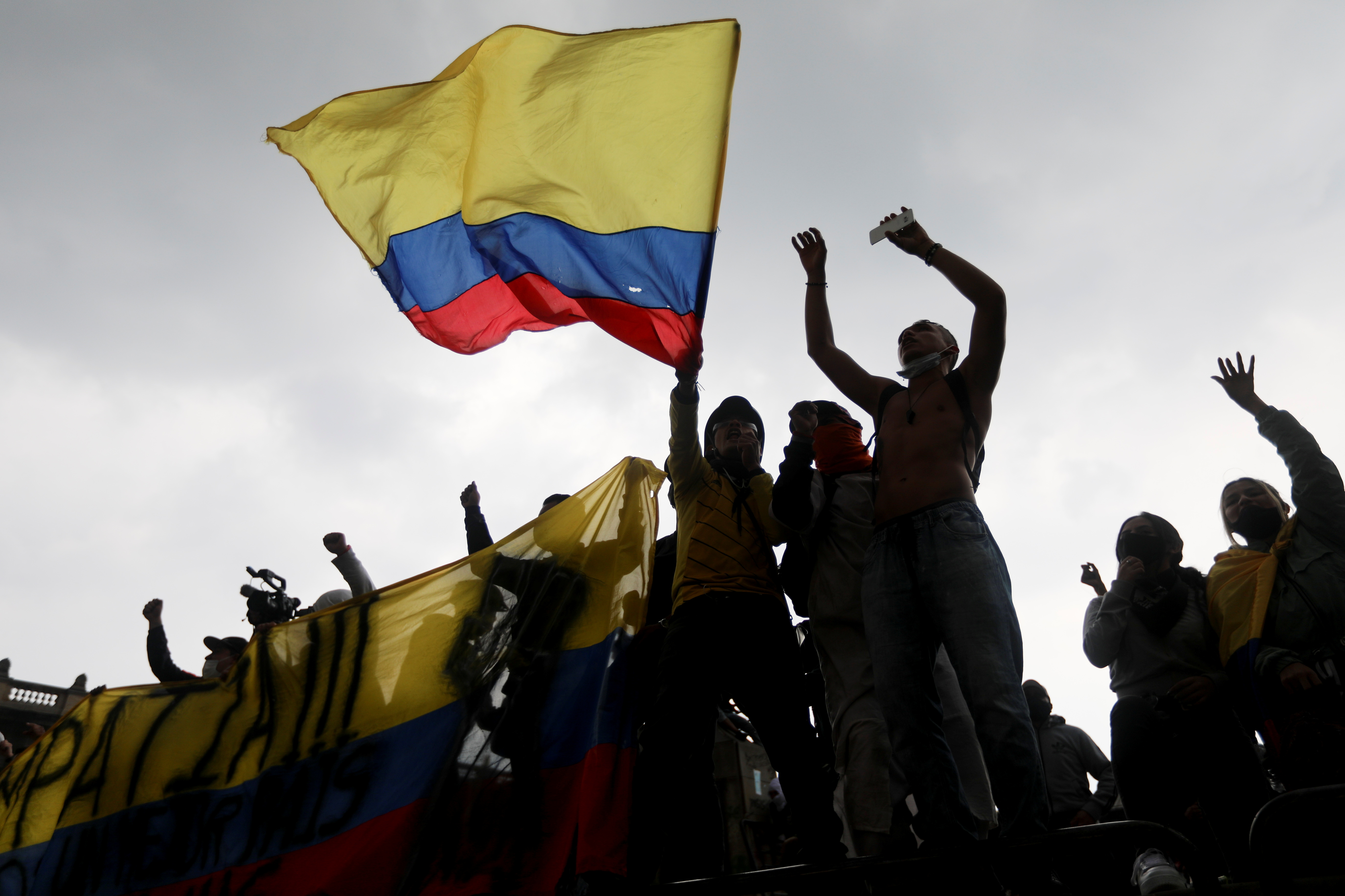 Demonstrators take part in a protest against the tax reform of President Ivan Duque's government in Bogota, Colombia on May 1, 2021 [Reuters/Luisa Gonzalez]