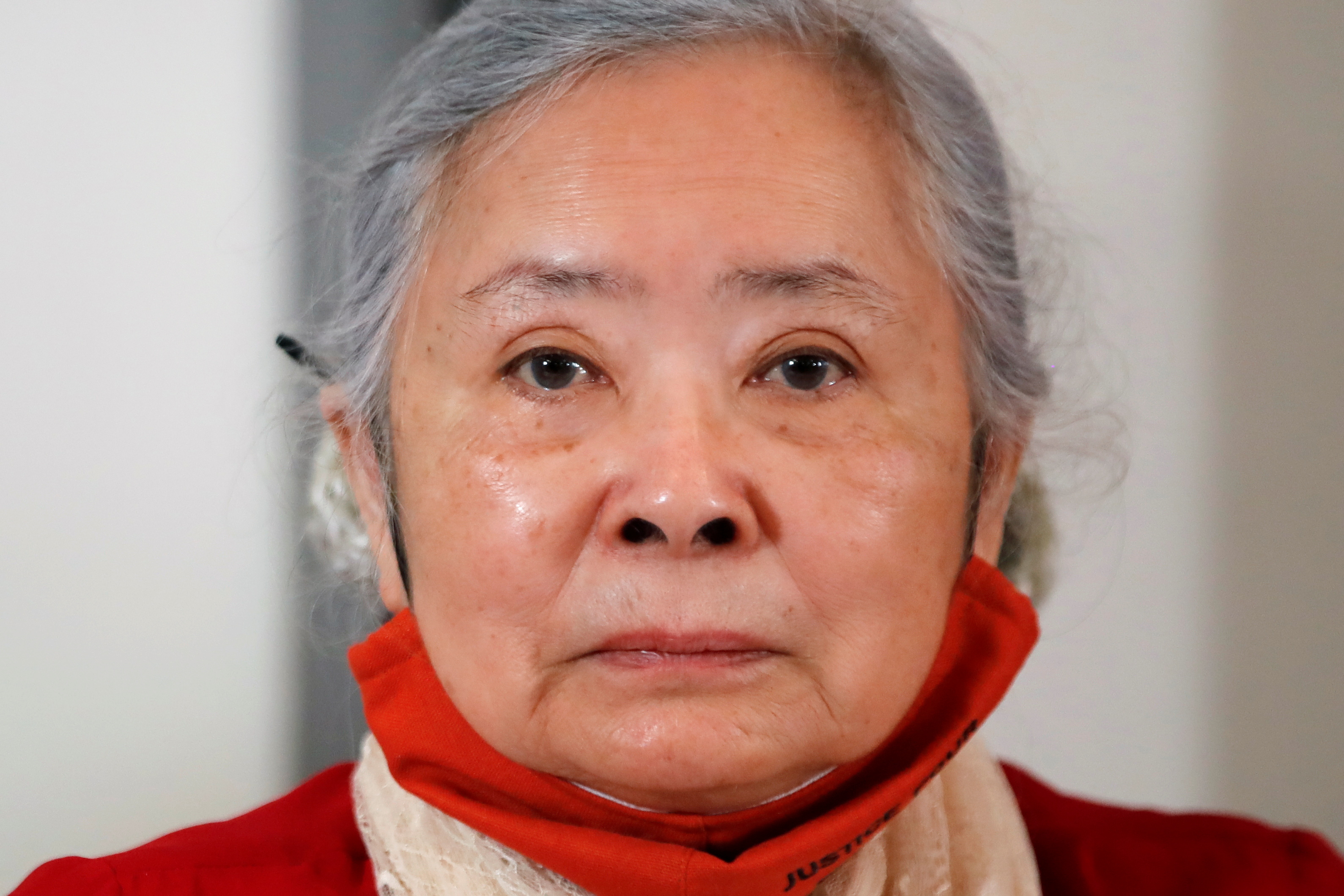 Trần Tố Nga, a French-Vietnamese woman who claims she was a victim of Agent Orange, attends a news conference in Paris, the day after a French court threw out her lawsuit against more than a dozen multinationals that produced and sold the toxic herbicide used by US troops during the war in Vietnam [Sarah Meyssonnier/Reuters]