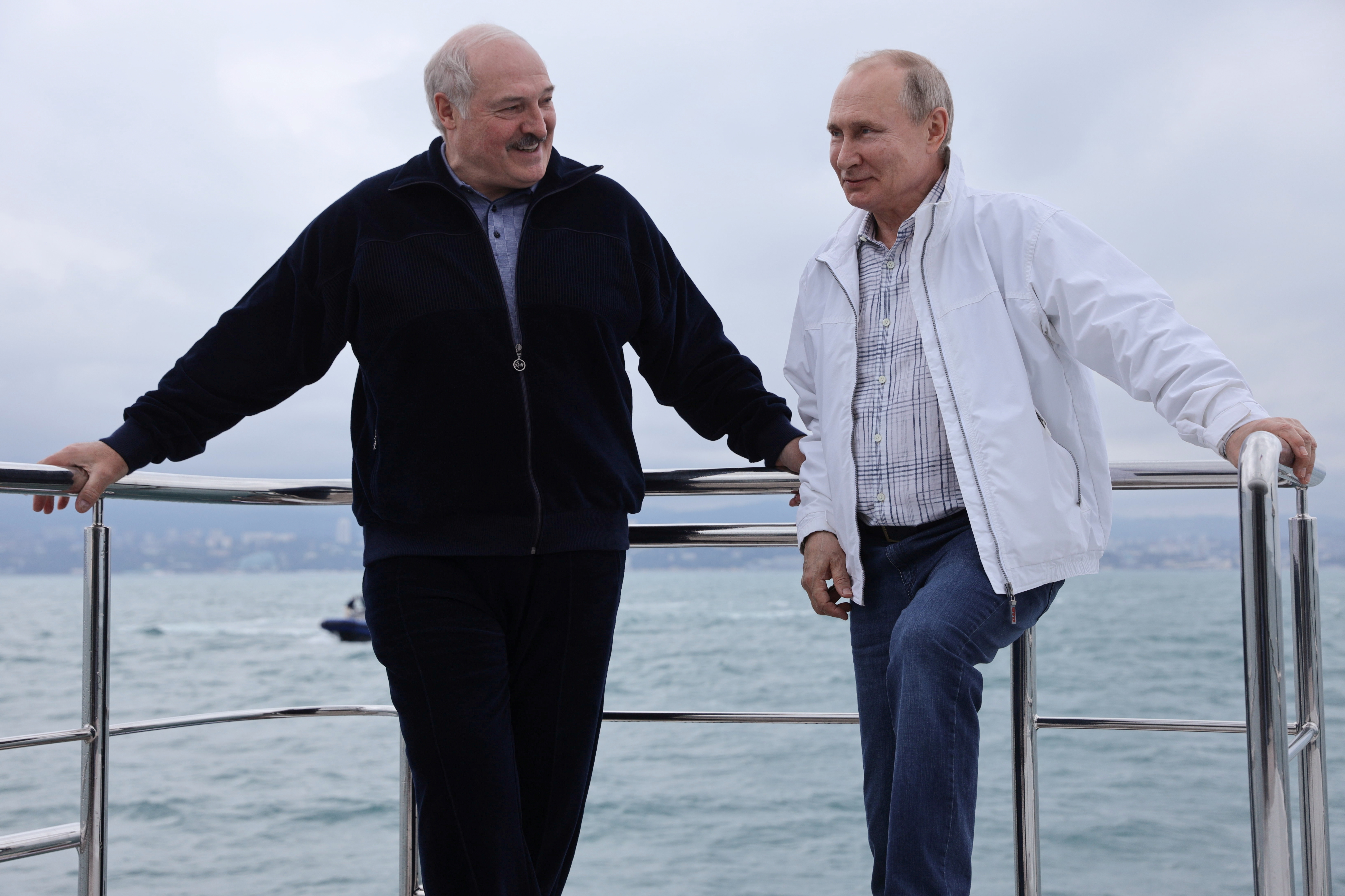 Russian President Vladimir Putin and his Belarusian counterpart Alexander Lukashenko posing by the sea