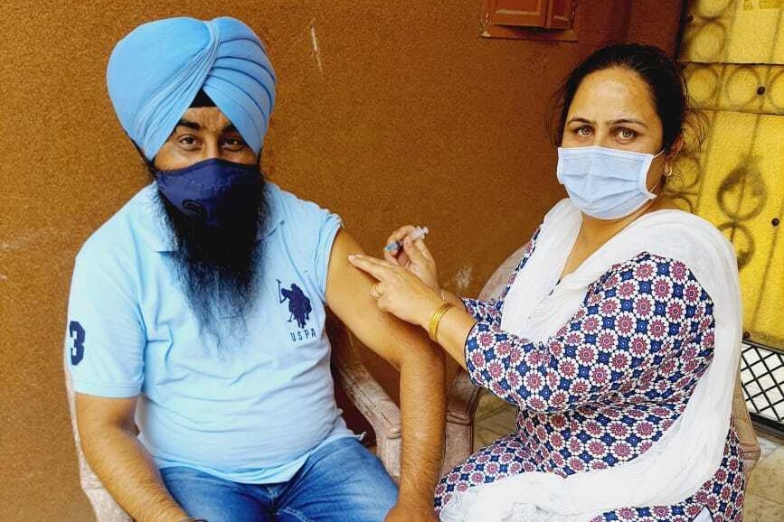 Nina Sharma working at the COVID vaccine clinic at the Nawanshahr government hospital in Punjab [Photo courtesy of Nina Sharma]