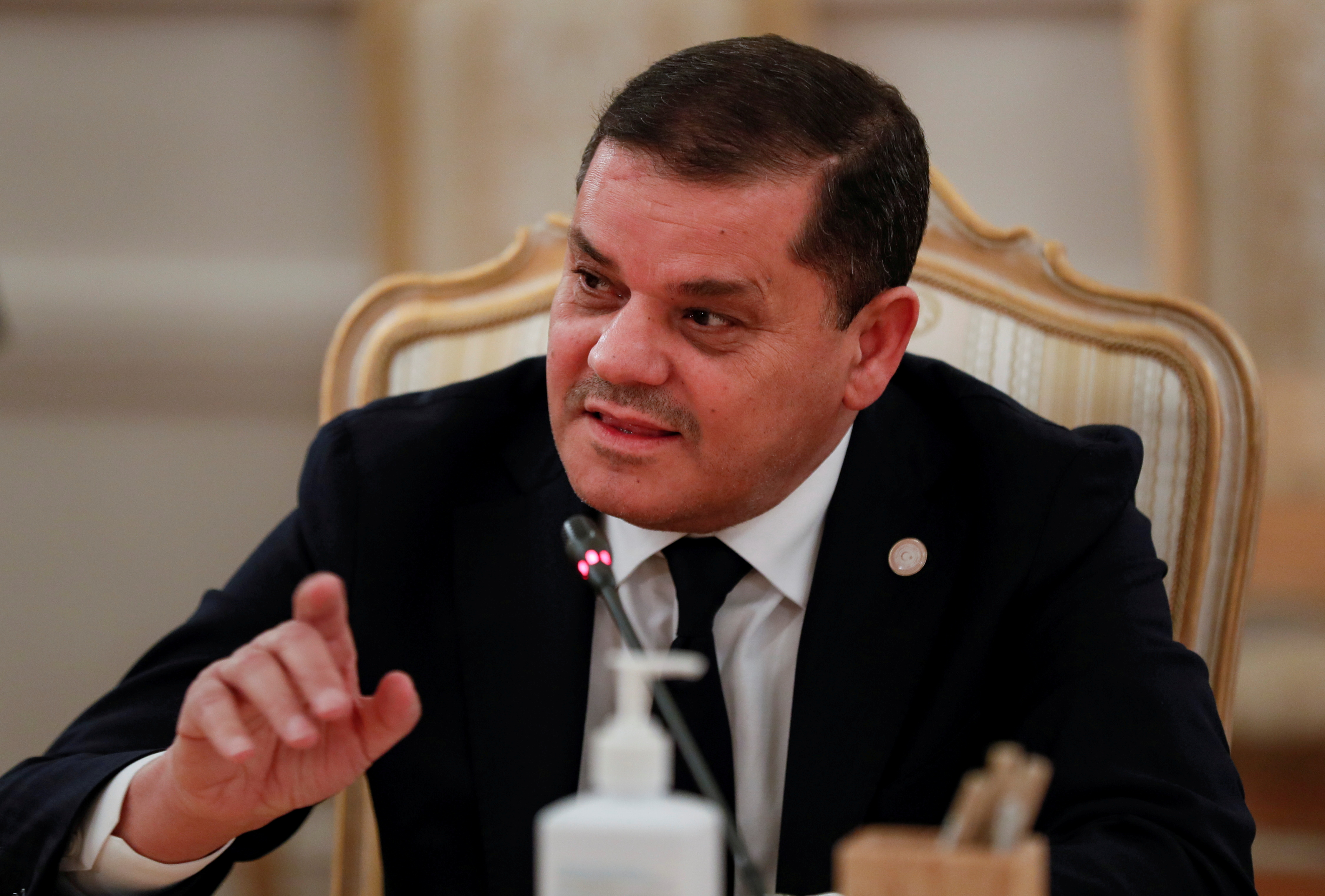 Dbeibah was appointed in March to lead the new Government of National Unity through a UN-facilitated process aimed at bringing peace and stability to Libya [File: Yuri Kochetkov/Pool via Reuters]