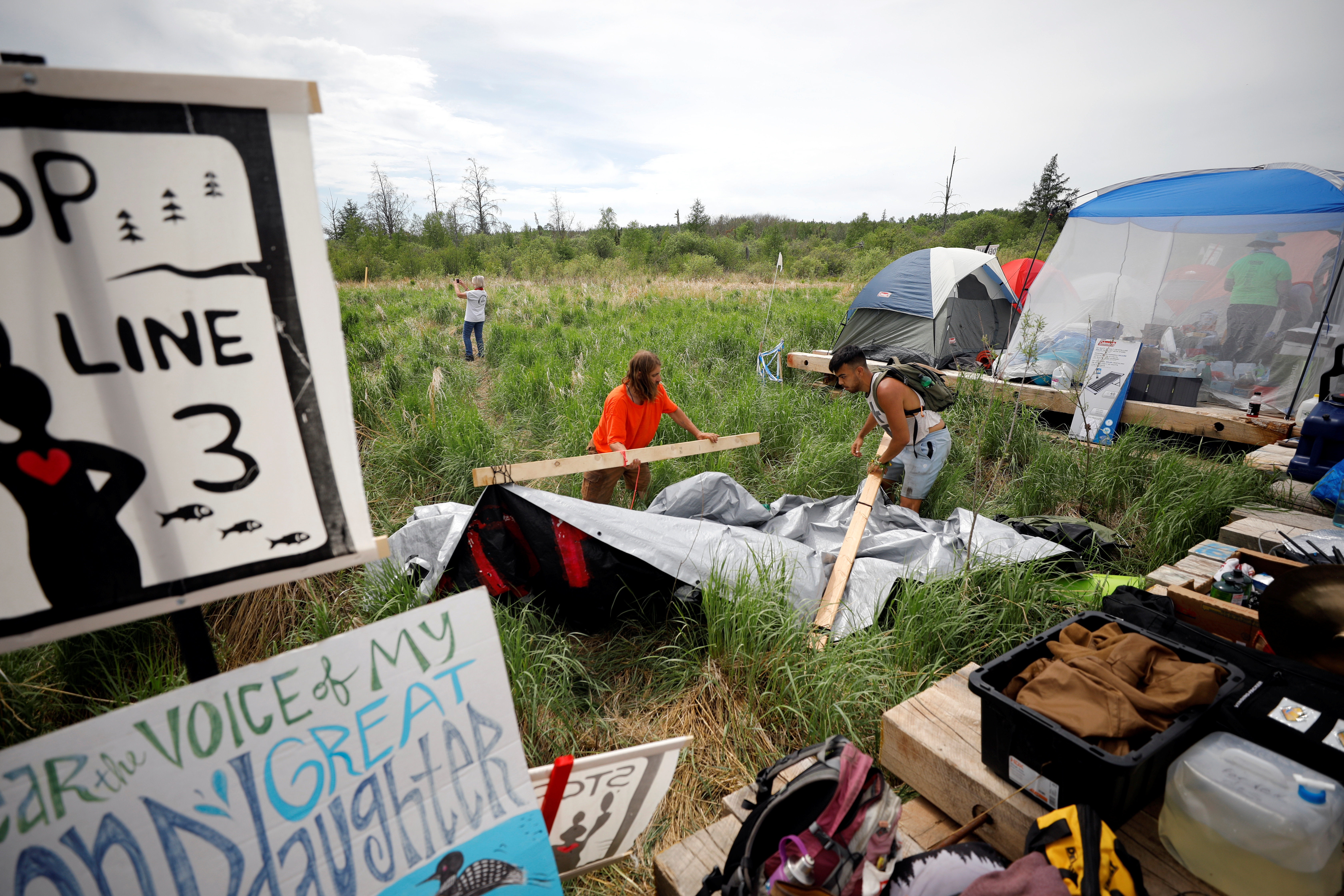 Water protectors organise a campsite established by Indigenous leaders and other activists at the Mississippi headwaters, on June 8