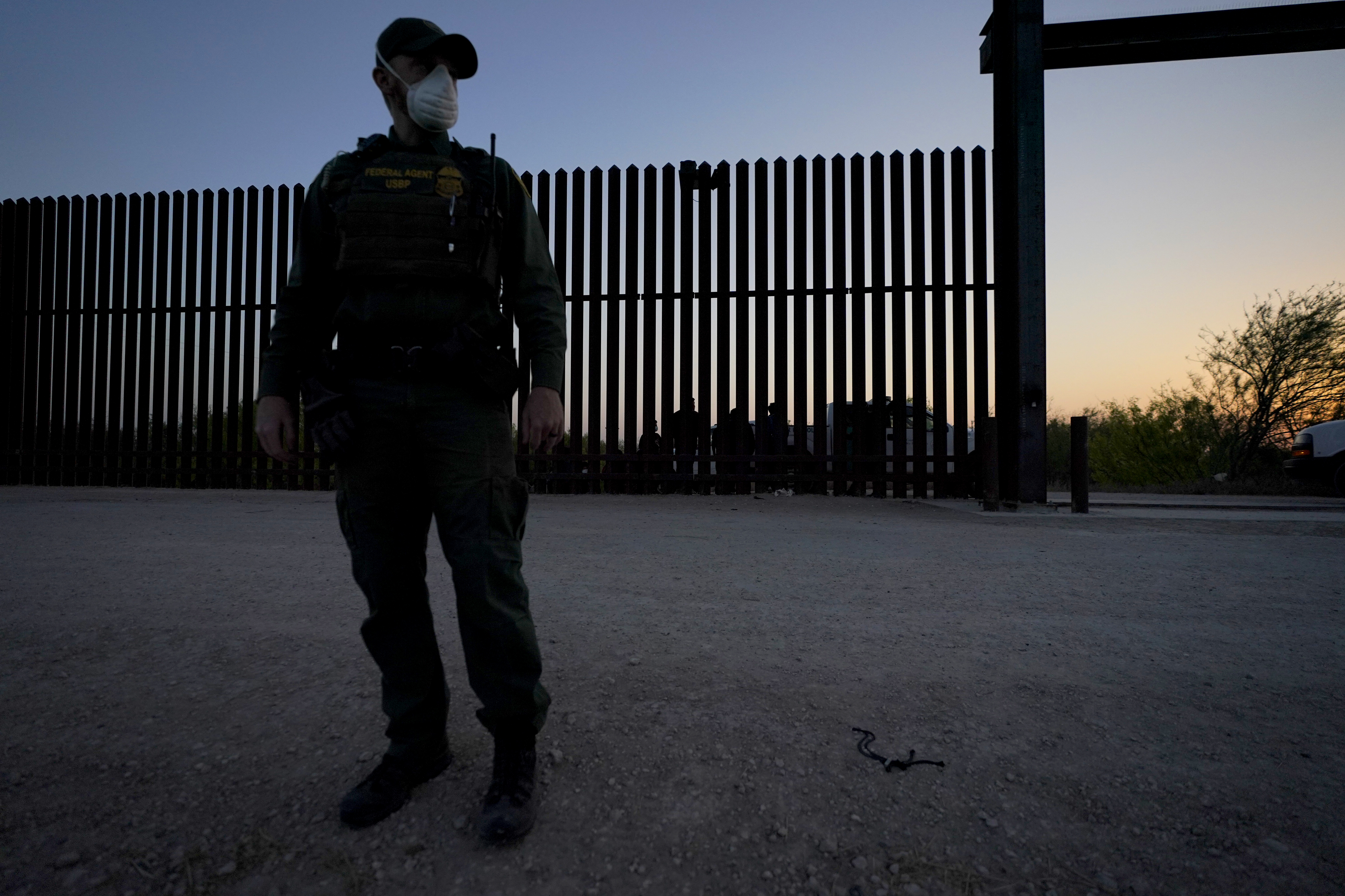 Former President Donald Trump built or restored portions of a wall, a key campaign promise; his successor Joe Biden halted all federal wall construction on his first day in office