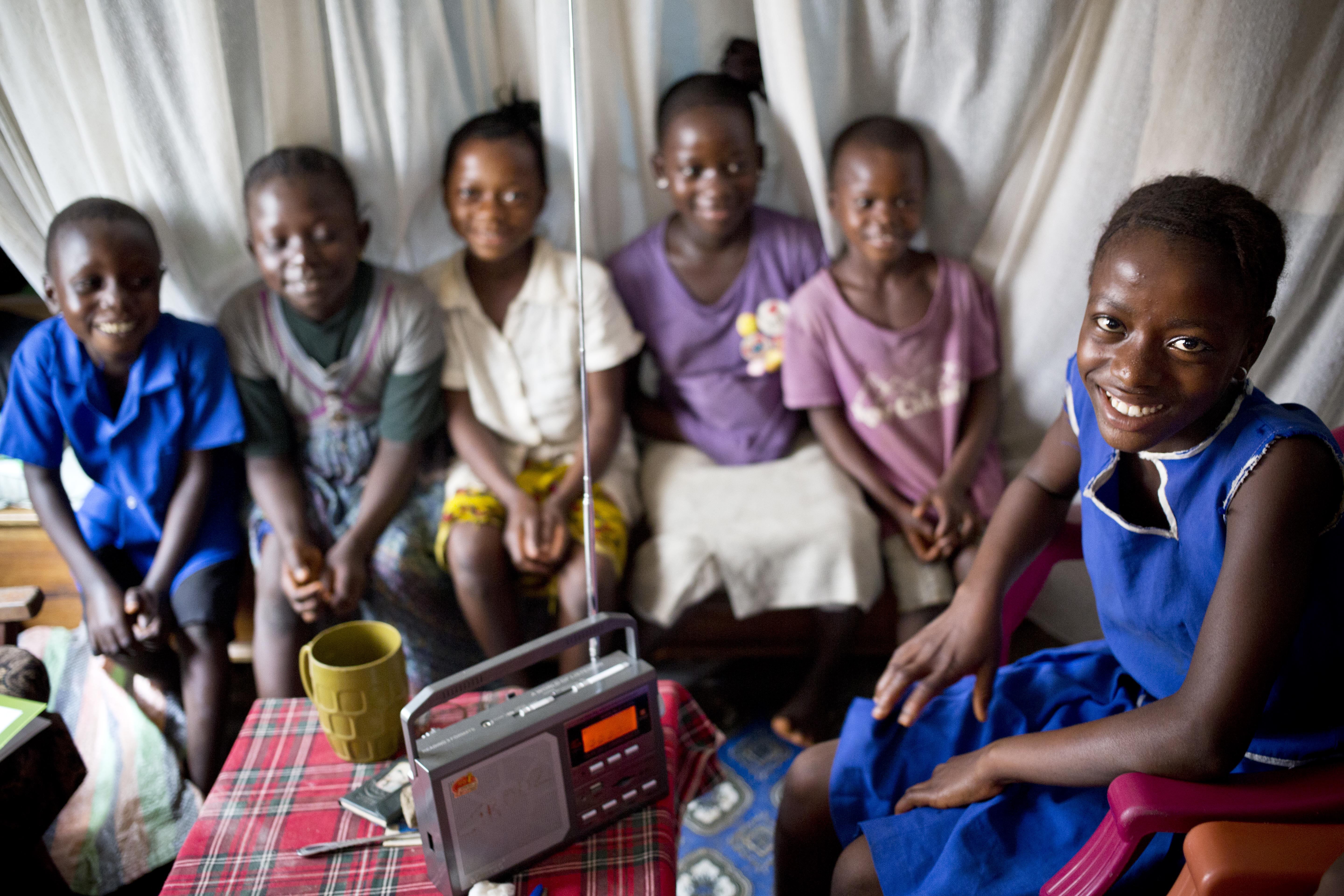 Hawanatu Kafula, whose community has been supported by Action Aid during the Ebola epidemic, poses for photographs in Gollu, Sierra Leone August 17, 2015 [Kate Holt]