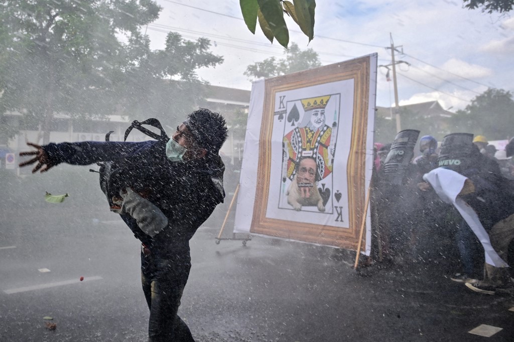 Public disaffection with the government has grown in lockstep with infections, reinvigorating a year-old protest movement calling on Prime Minister Prayut Chan-ocha to step down [FileL Lillian Suwanrumpha/AFP]