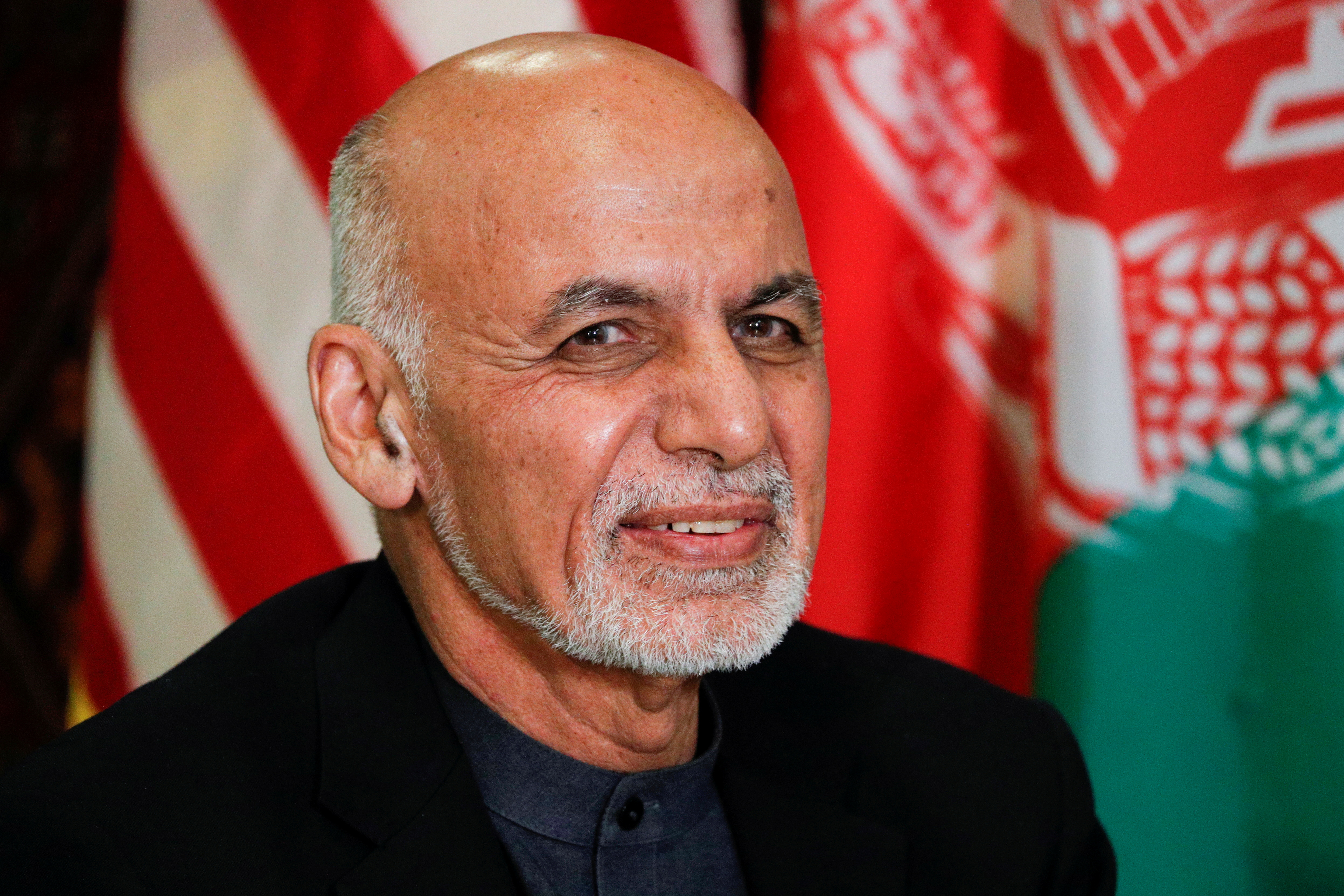 President Ashraf Ghani fled Afghanistan as the Taliban closed in on Kabul [File: Stringer/Reuters]