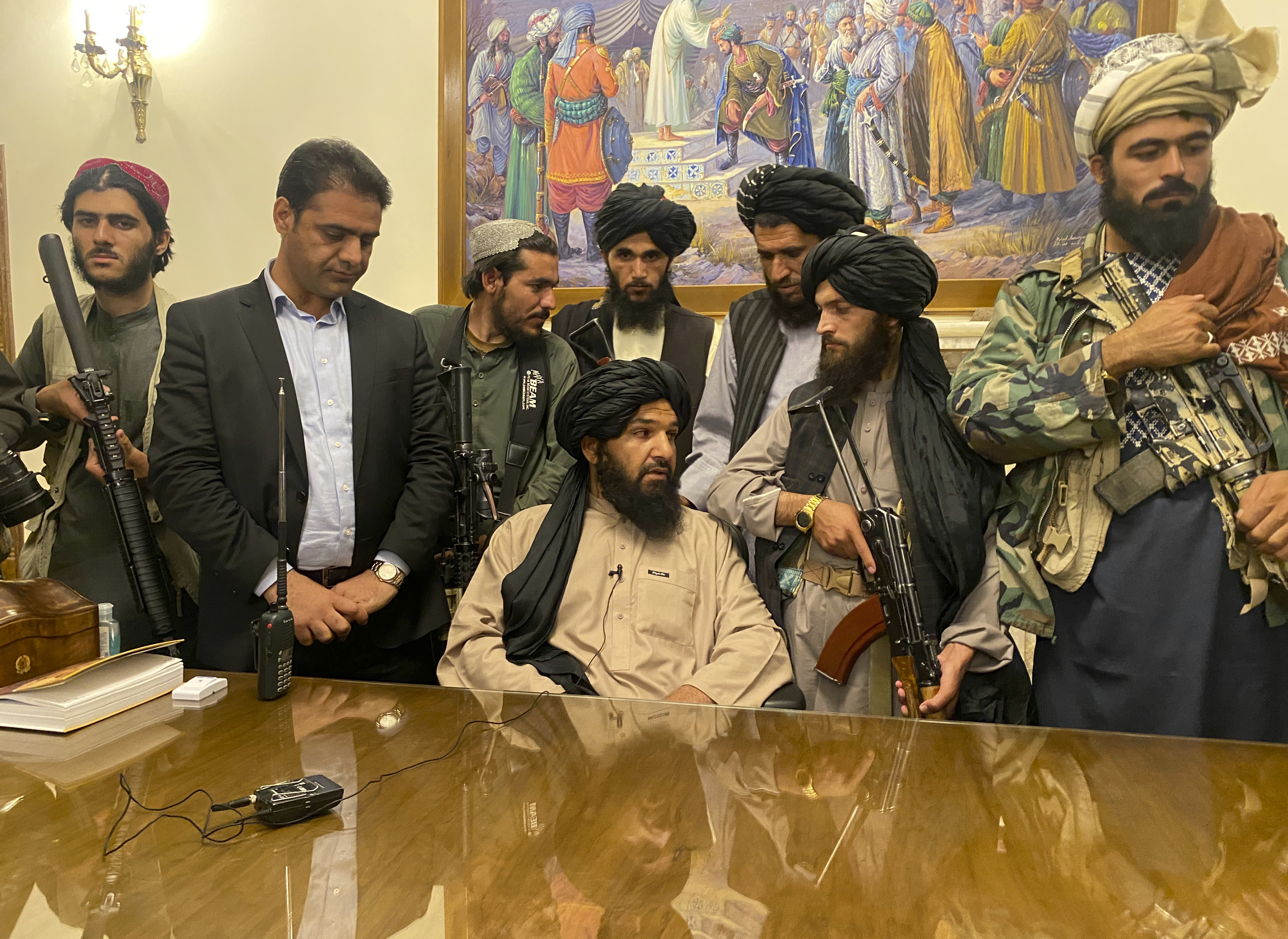 Taliban fighters take control of Afghan presidential palace after the Afghan President Ashraf Ghani fled the country, in Kabul, Afghanistan on August 15, 2021 [AP/Zabi Karimi]