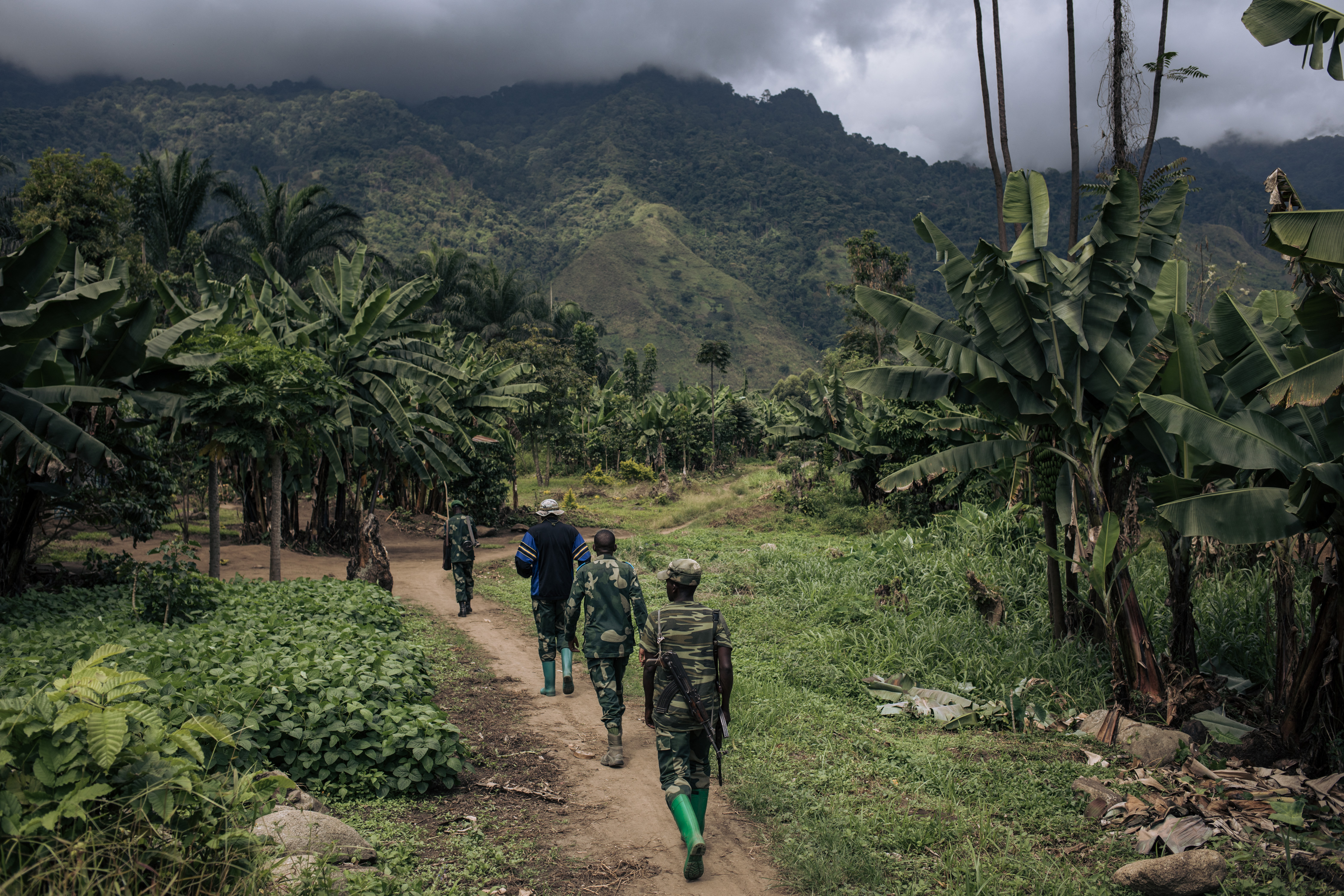 Congolese soldiers patrol the village of Mwenda, recently attacked by the armed group Allied Democratic Forces (ADF), in Rwenzori Sector, northeastern Democratic Republic of Congo, on May 23, 2021.