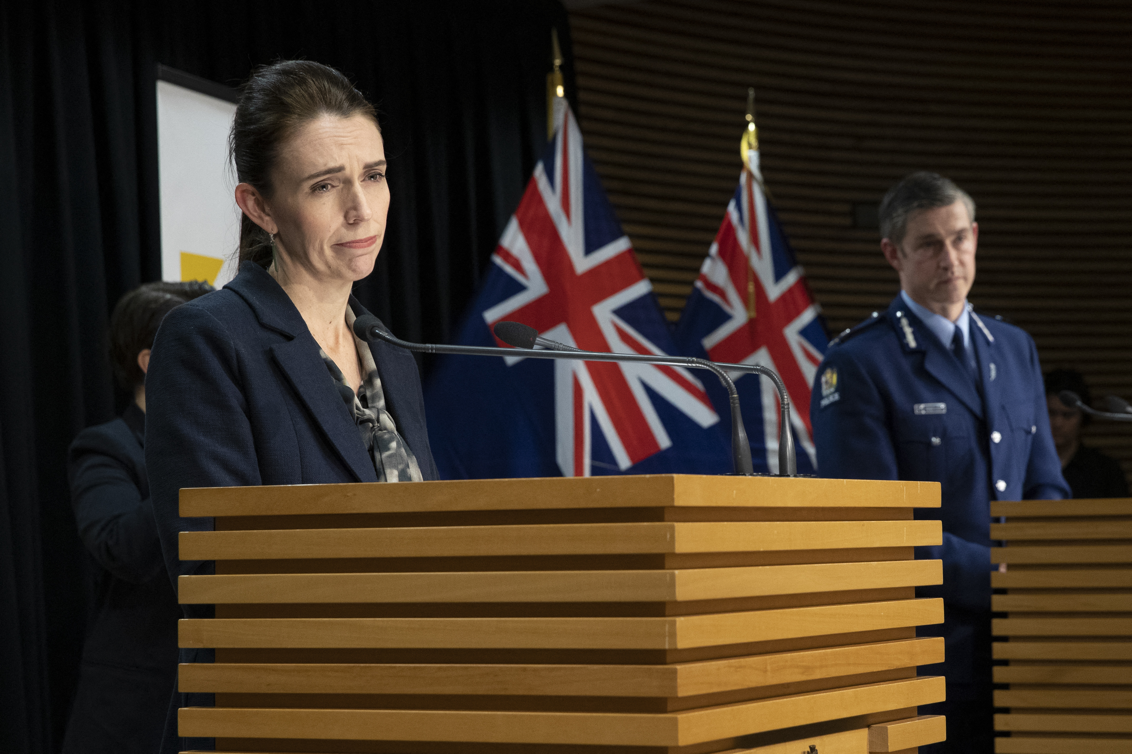 New Zealand's Prime Minister Jacinda Ardern and Commissioner of Police Andrew Coster speak during a press conference in Wellington on September 4, 2021, after the country recorded its first COVID-related death in six months [Mark Mitchell/AFP]