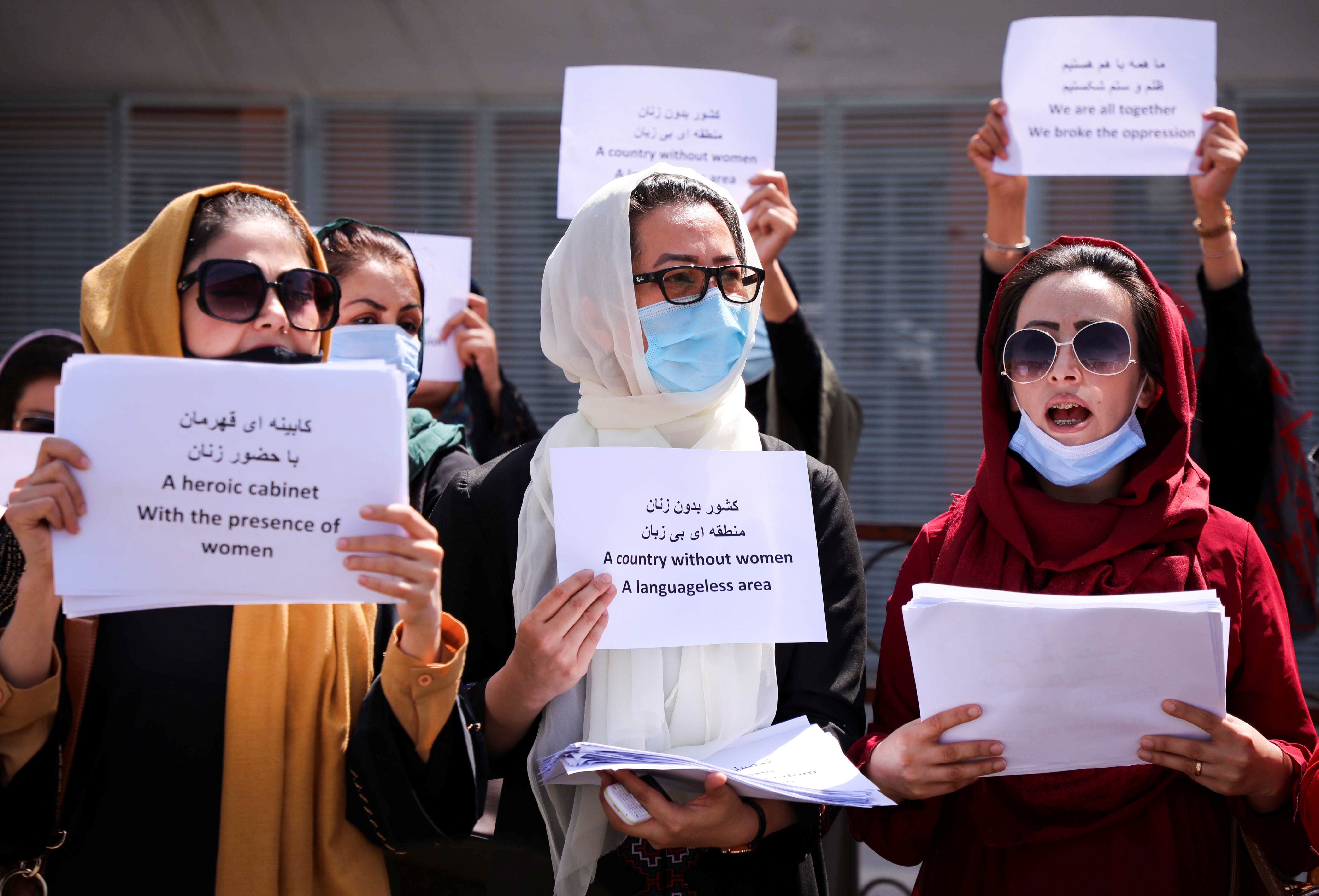 Afghan women's rights defenders and civil activists demonstrate calling for the preservation of their achievements and education under the Taliban government, in front of the presidential palace in Kabul, on September 3, 2021 [File: Reuters/Stringer]