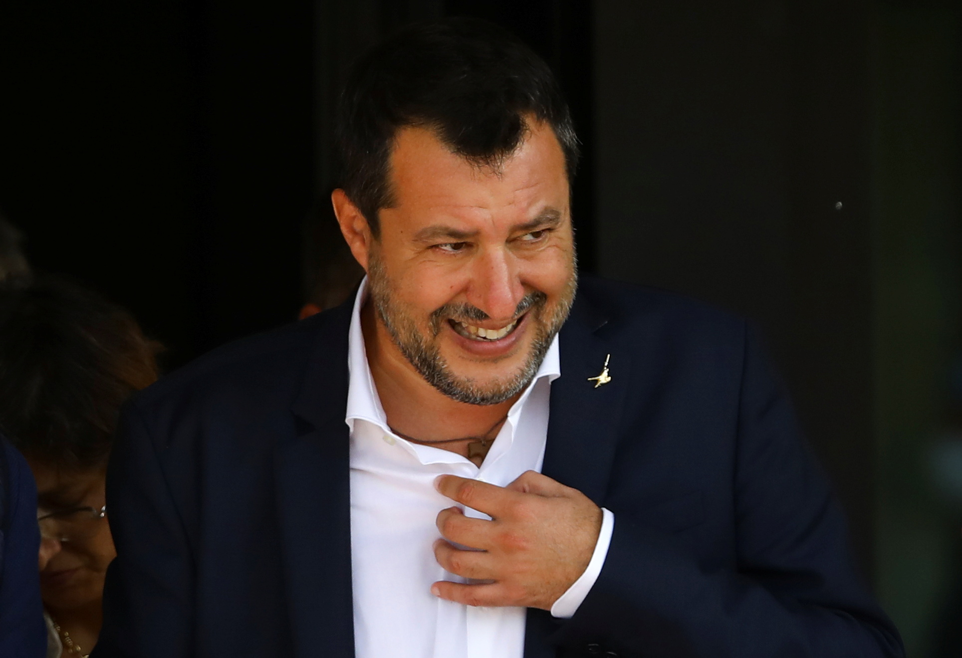Leader of Italy’s right-wing League party Matteo Salvini reacts as he leaves after a hearing in the trial against him on charges of kidnapping