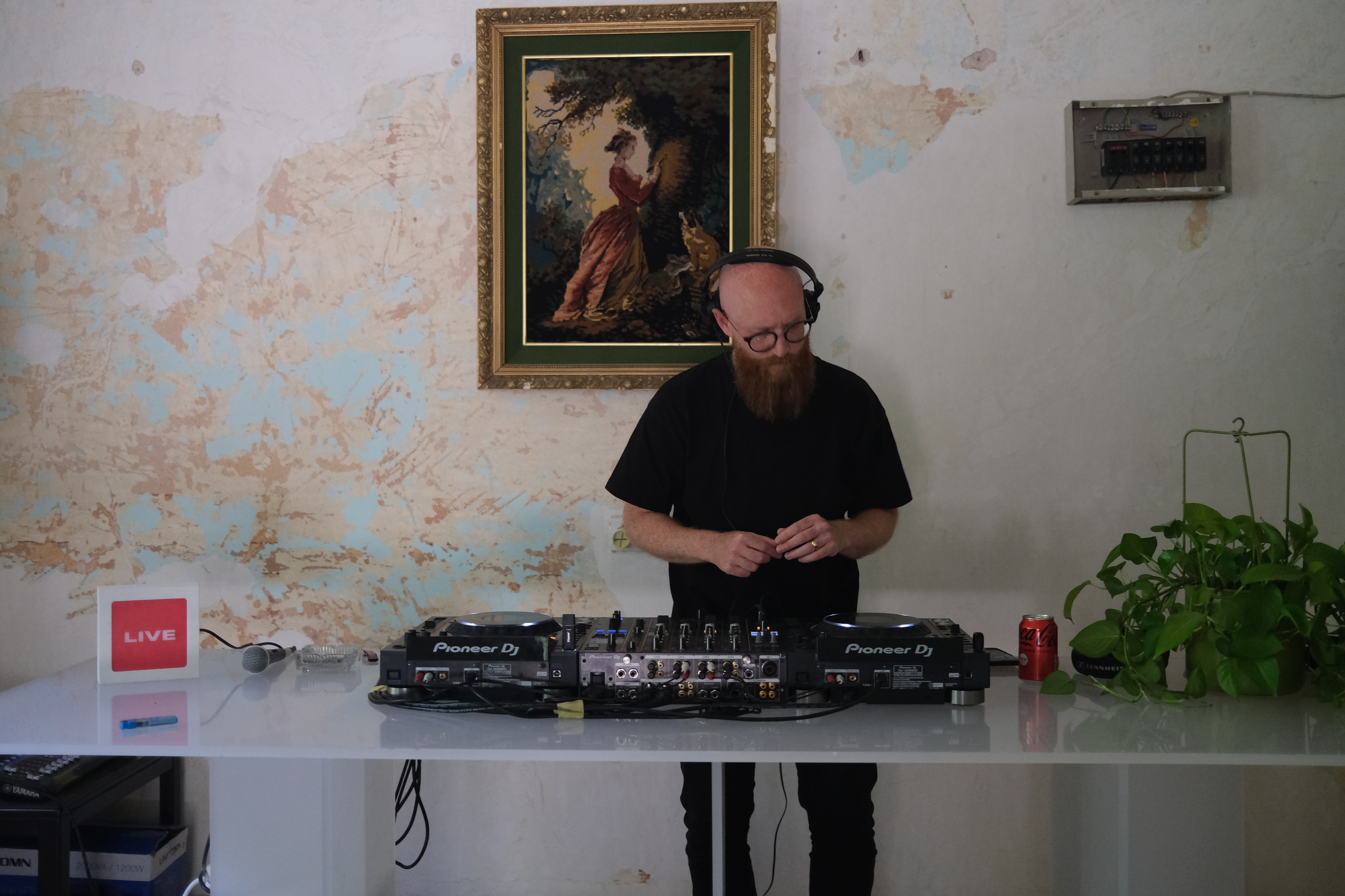 Radio Alhara resident DJ Andrew Collingwood plays as part of the Sonic Liberation Front broadcast [Photo courtesy of Radio Alhara]