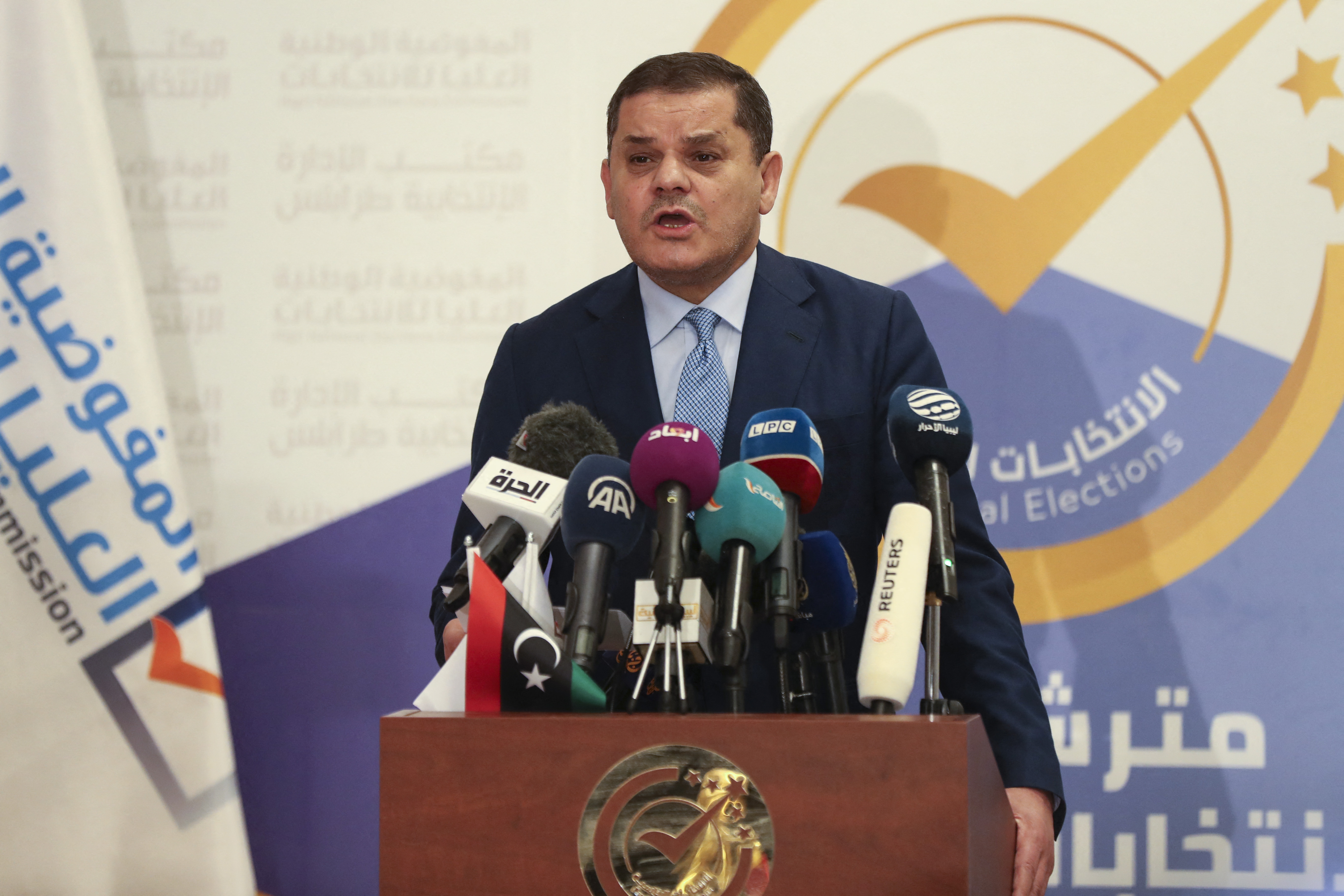 Libya's interim Prime Minister Abdulhamid Dbeibah speaks after registering his candidacy for next month's presidential election on November 21, 2021 in the capital Tripoli.