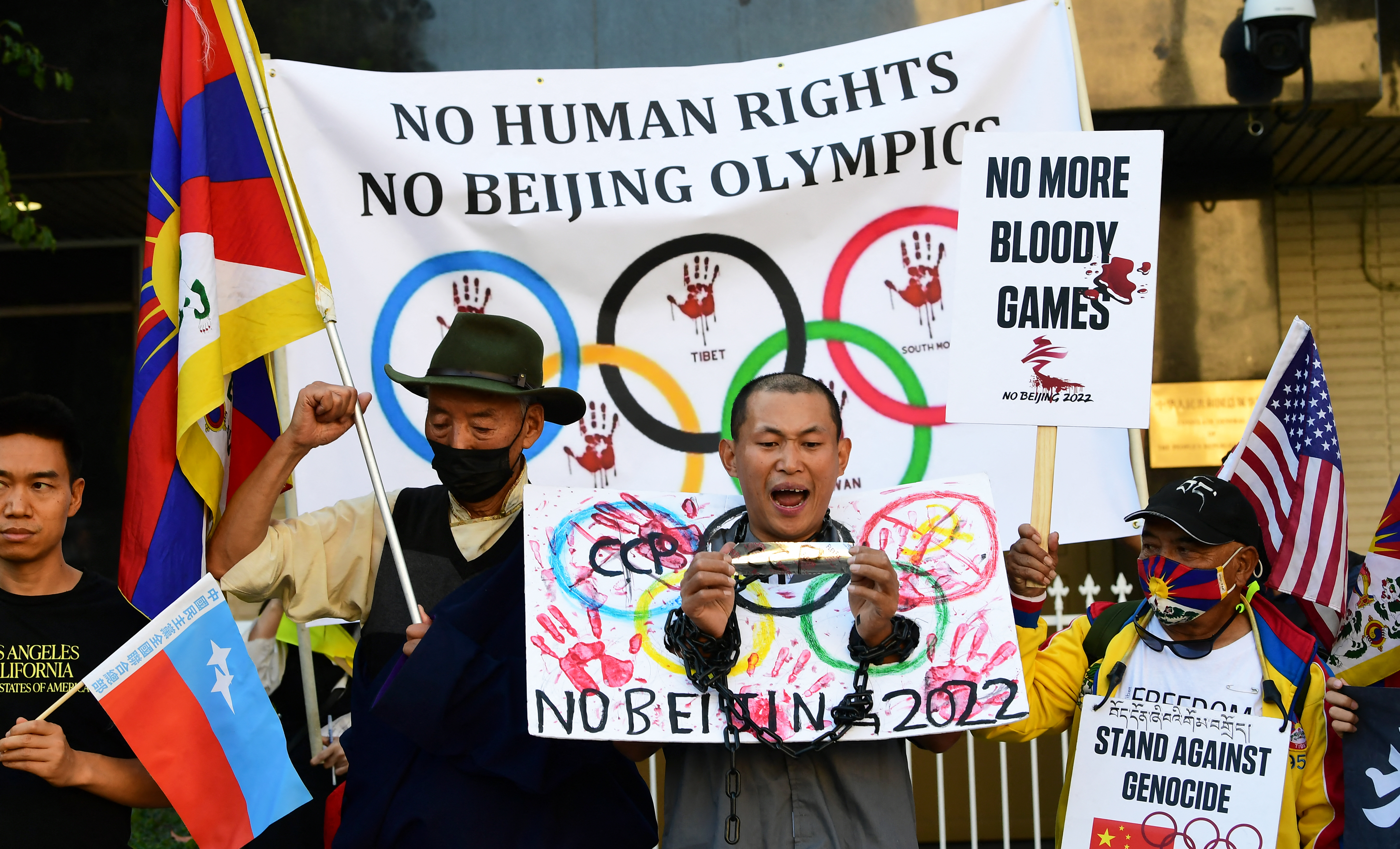 Activists rally in front of the Chinese Consulate in Los Angeles