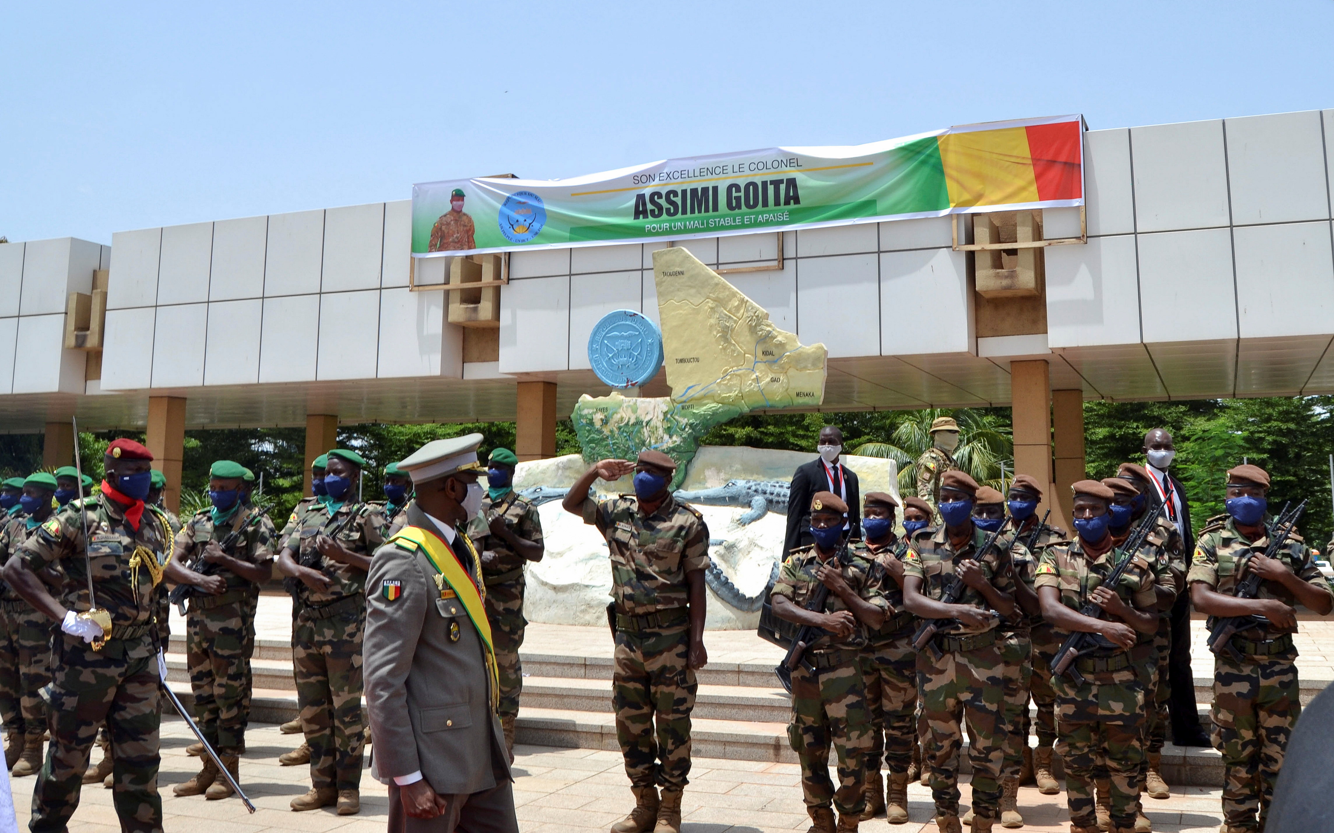 Colonel Assimi Goita, new interim president of Mali, walks during his inauguration ceremony in Bamako, Mali