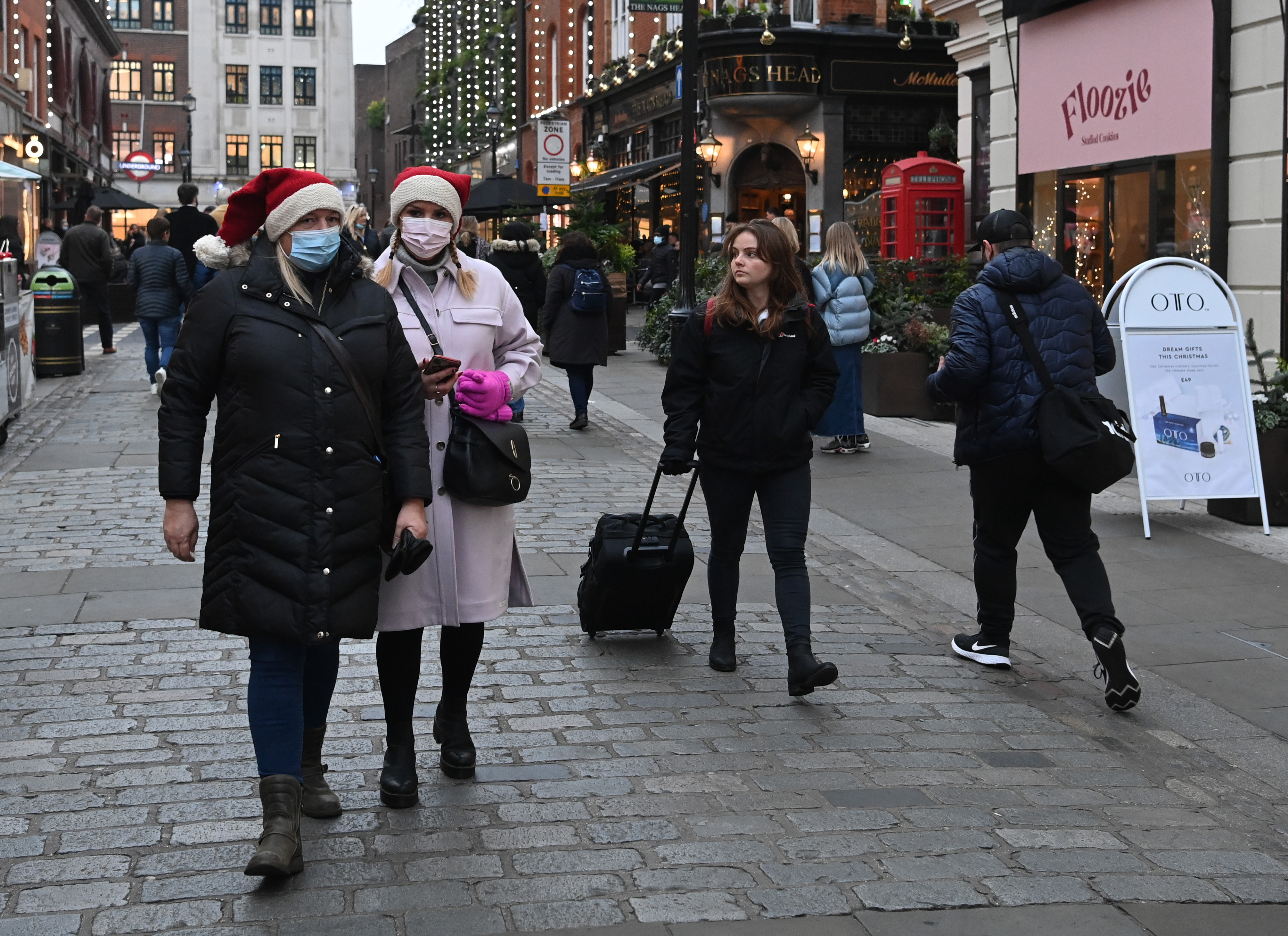 Pedestrians in Covent Garden in London, Britain