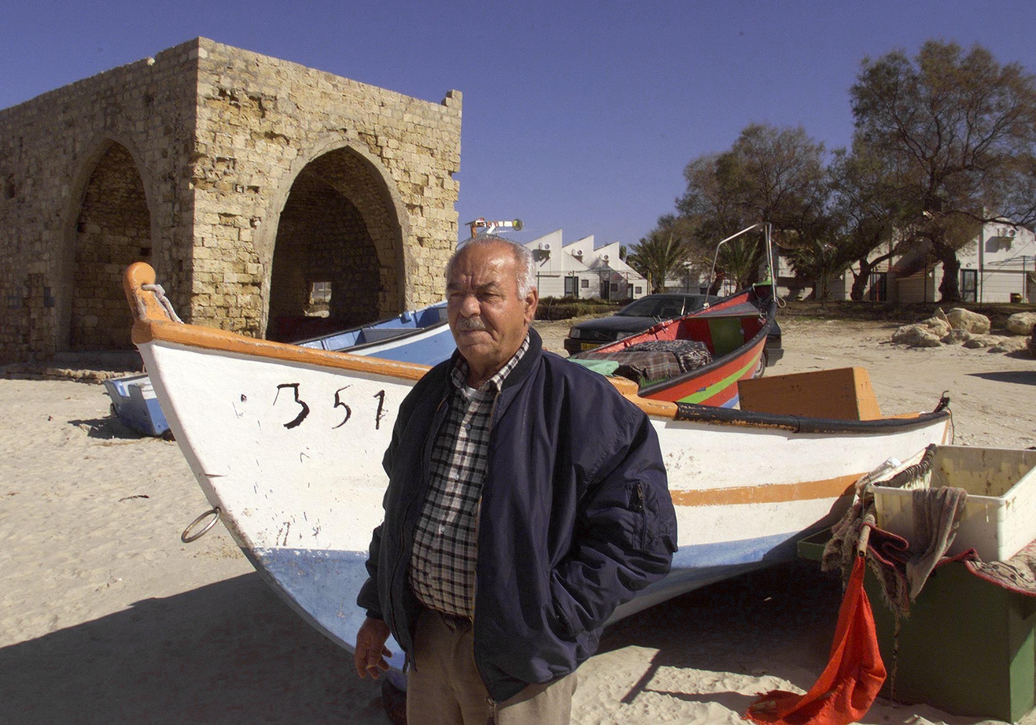 A Palestinian man poses on the site of Tantura, a Palestinian coastal village that was ethnically cleansed in 1948