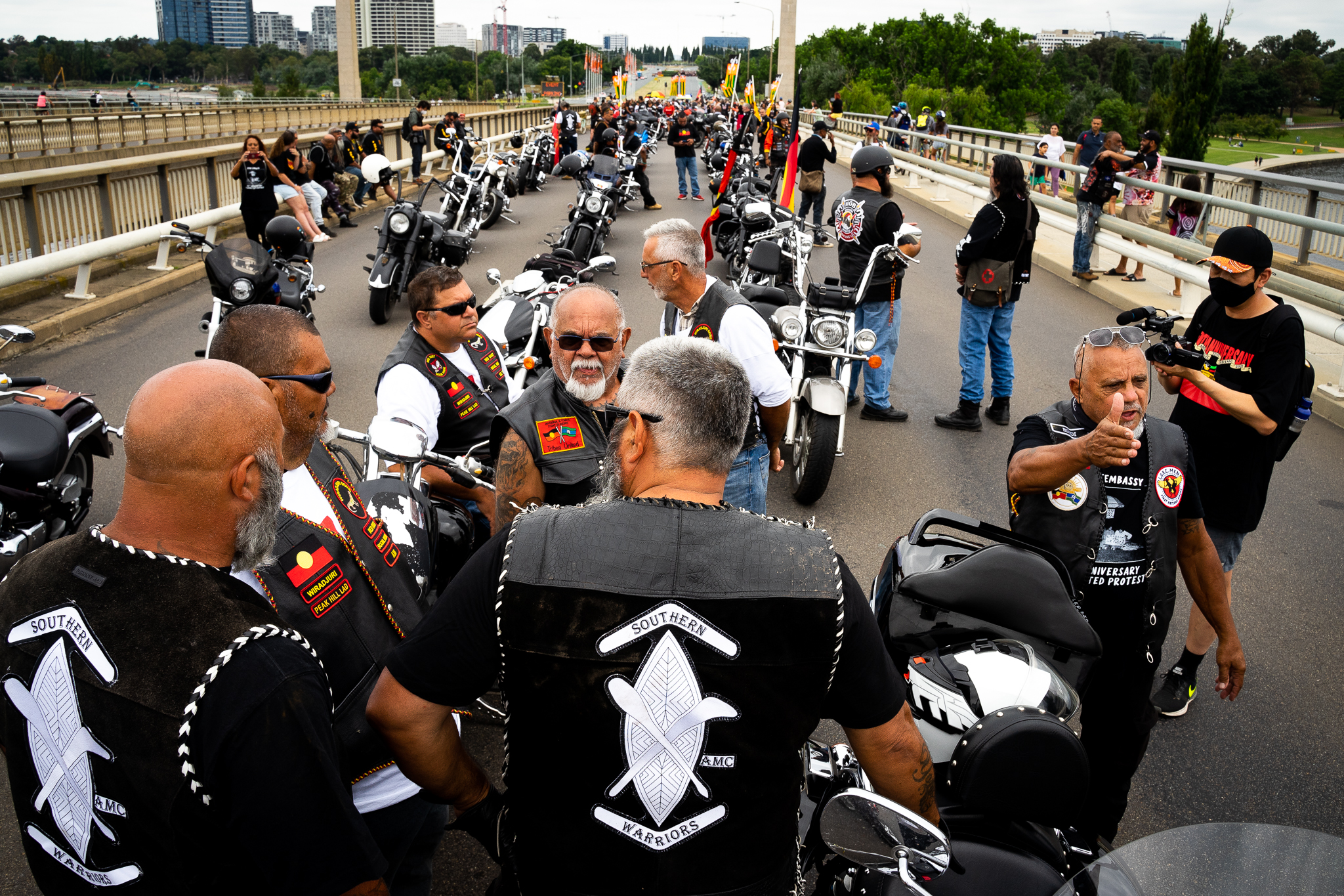 LORE Maker Bindi directs traffic at the front of the protest and discusses which route to take to Parliament House.
