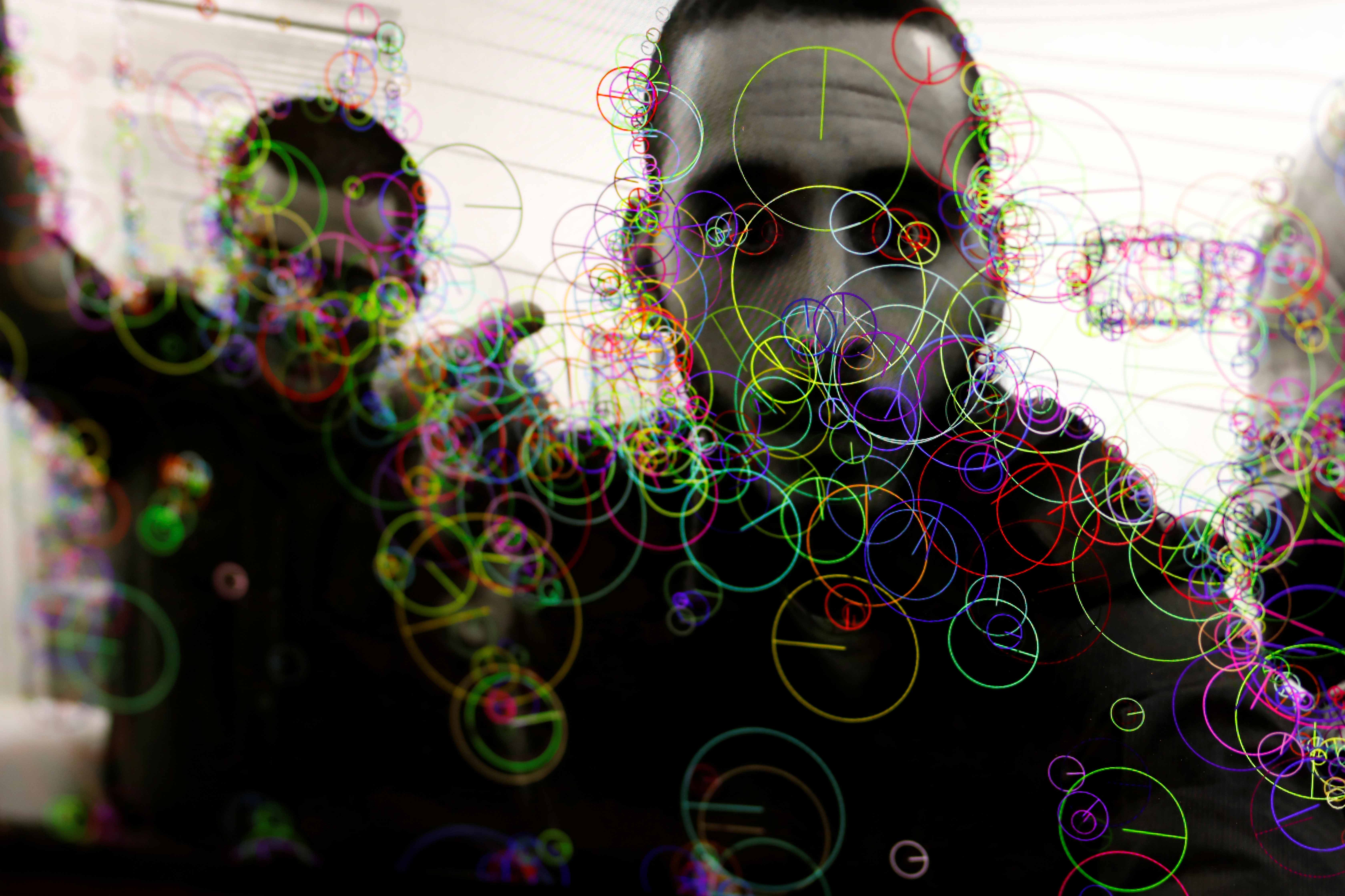 An image of Israeli soldiers is seen on a computer screen with colourful markings of a face recognition programming script during a cybersecurity training course in Beersheba, Israel in August 2017