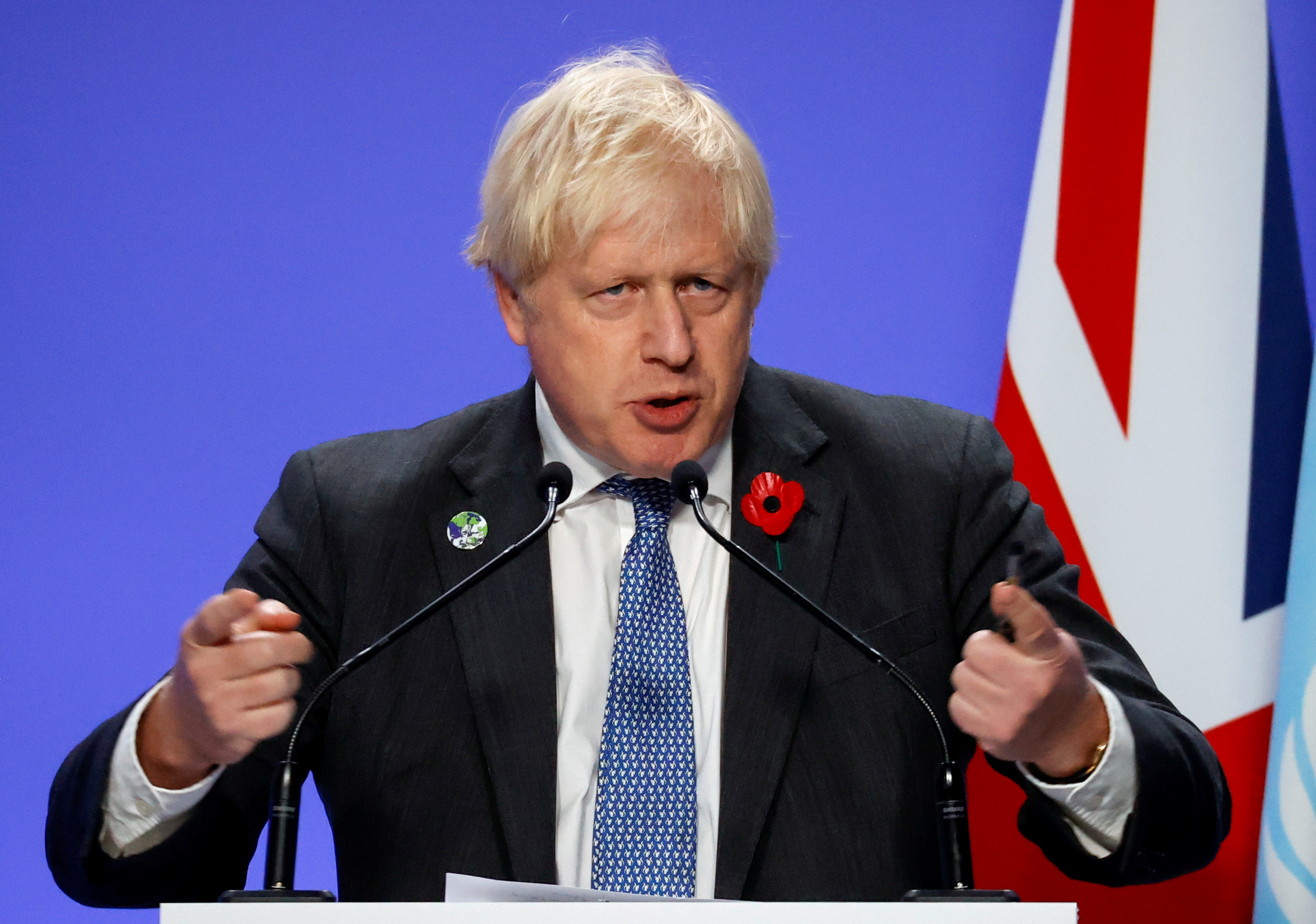Britain's Prime Minister Boris Johnson holds a news conference during the UN Climate Change Conference (COP26) in Glasgow