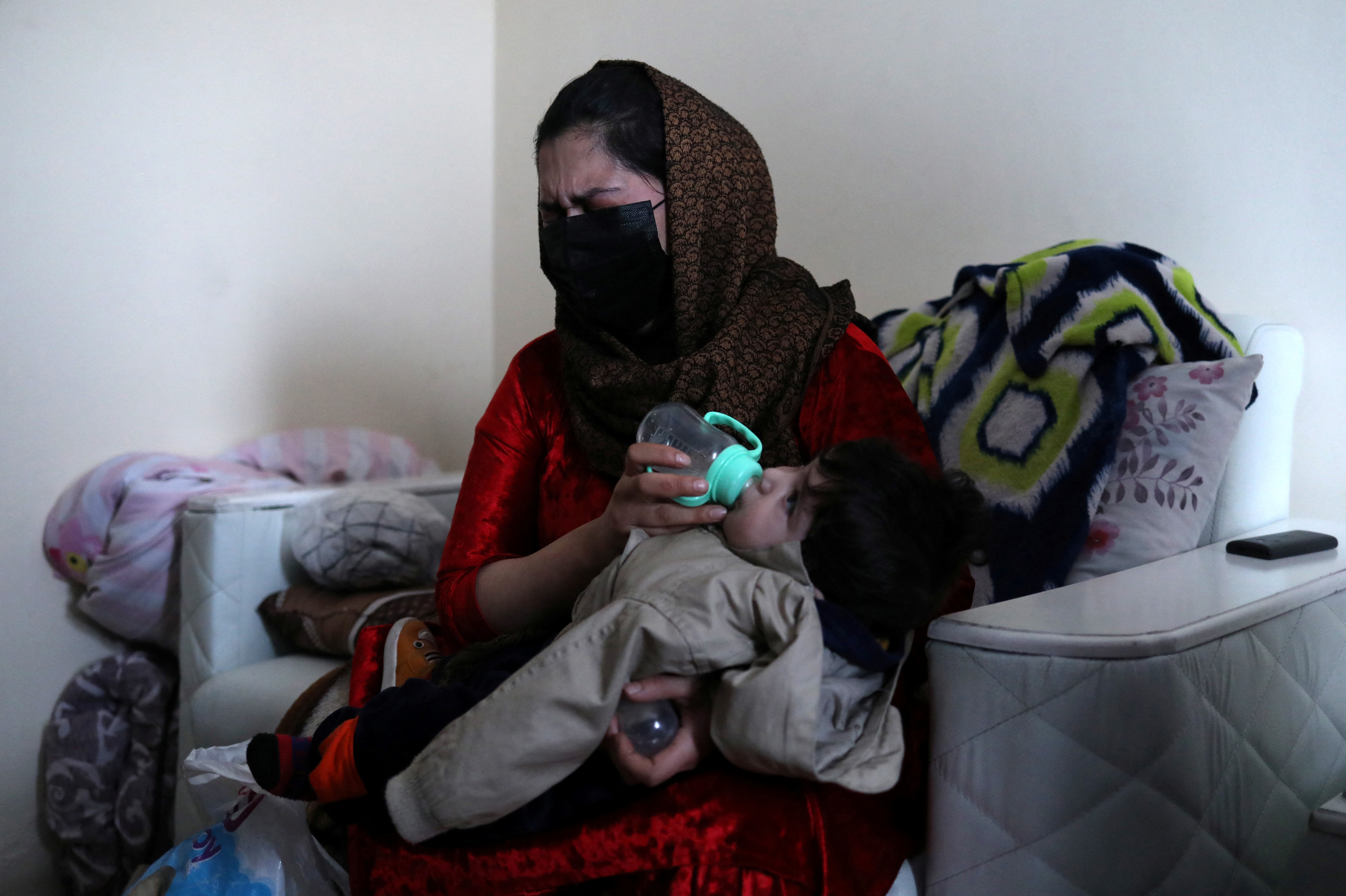 Afghan baby lost in US airlift chaos reunited with family