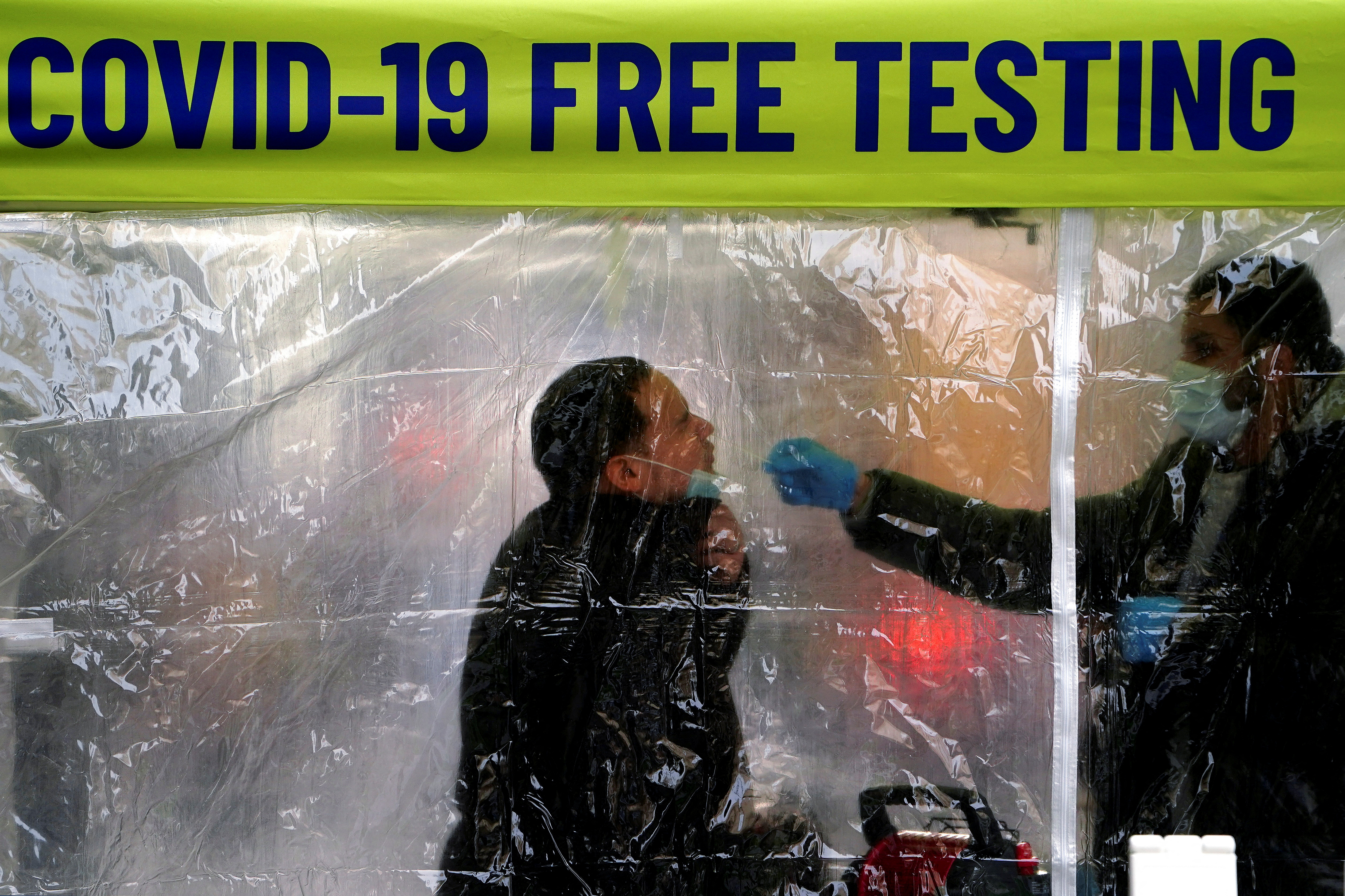 A person getting testing for COVID