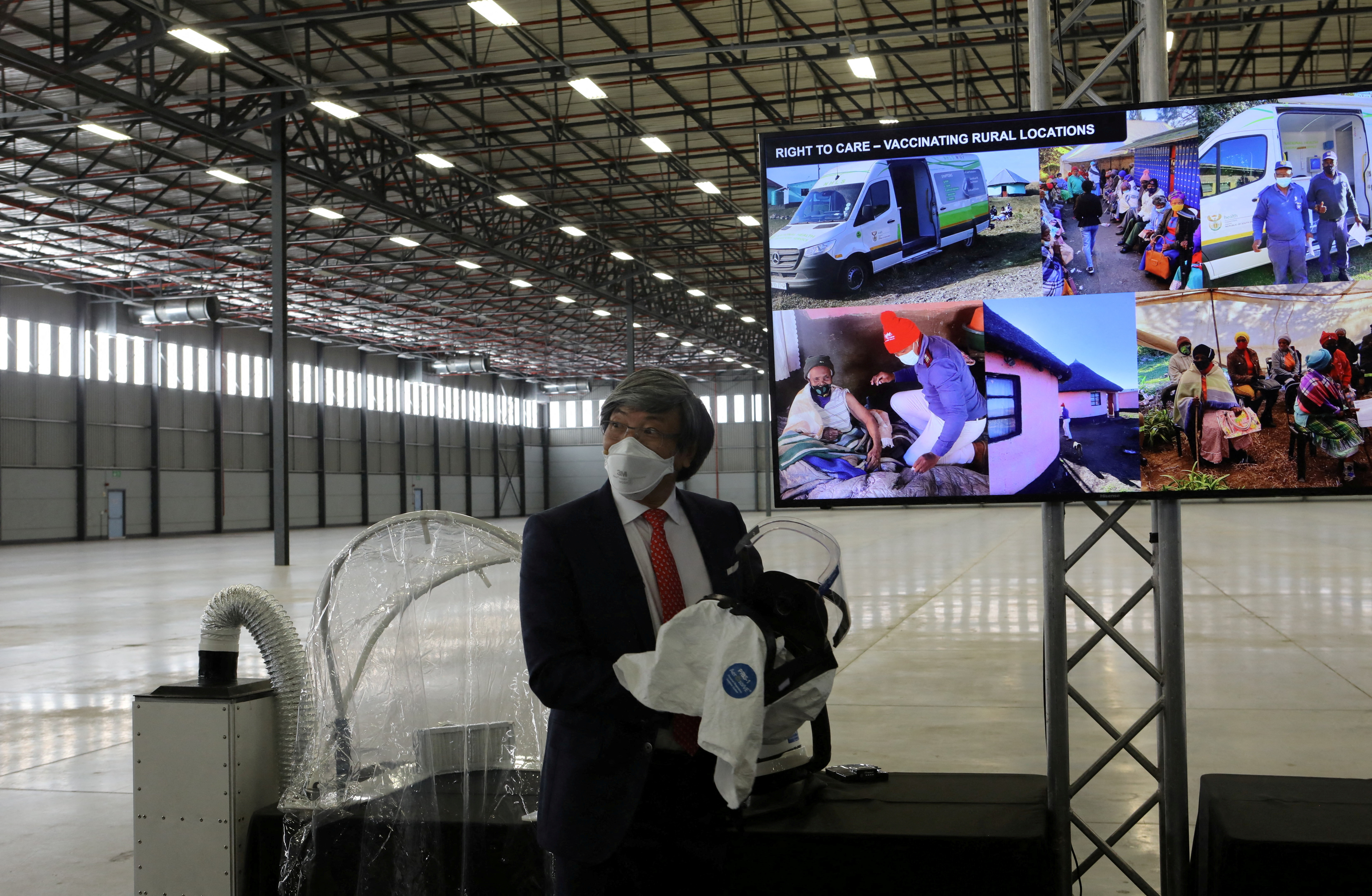 Dr. Patrick Soon-Shiong looks on during a tour of NantSA