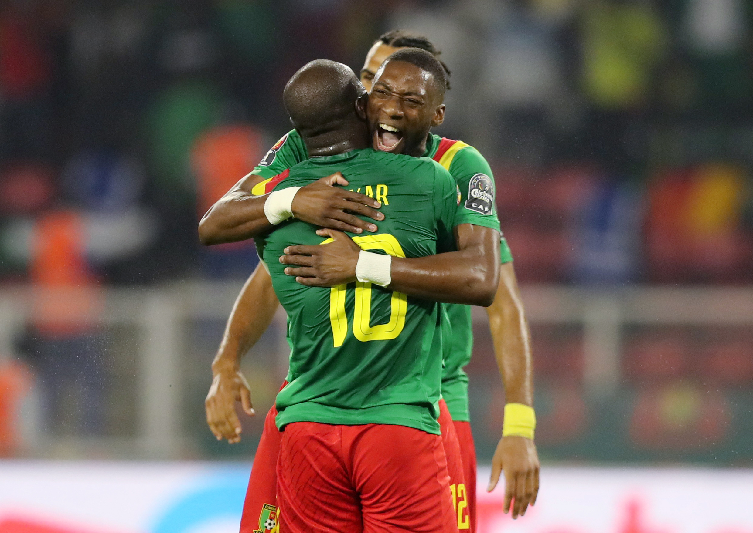 cameroon celebrate after winning a football match
