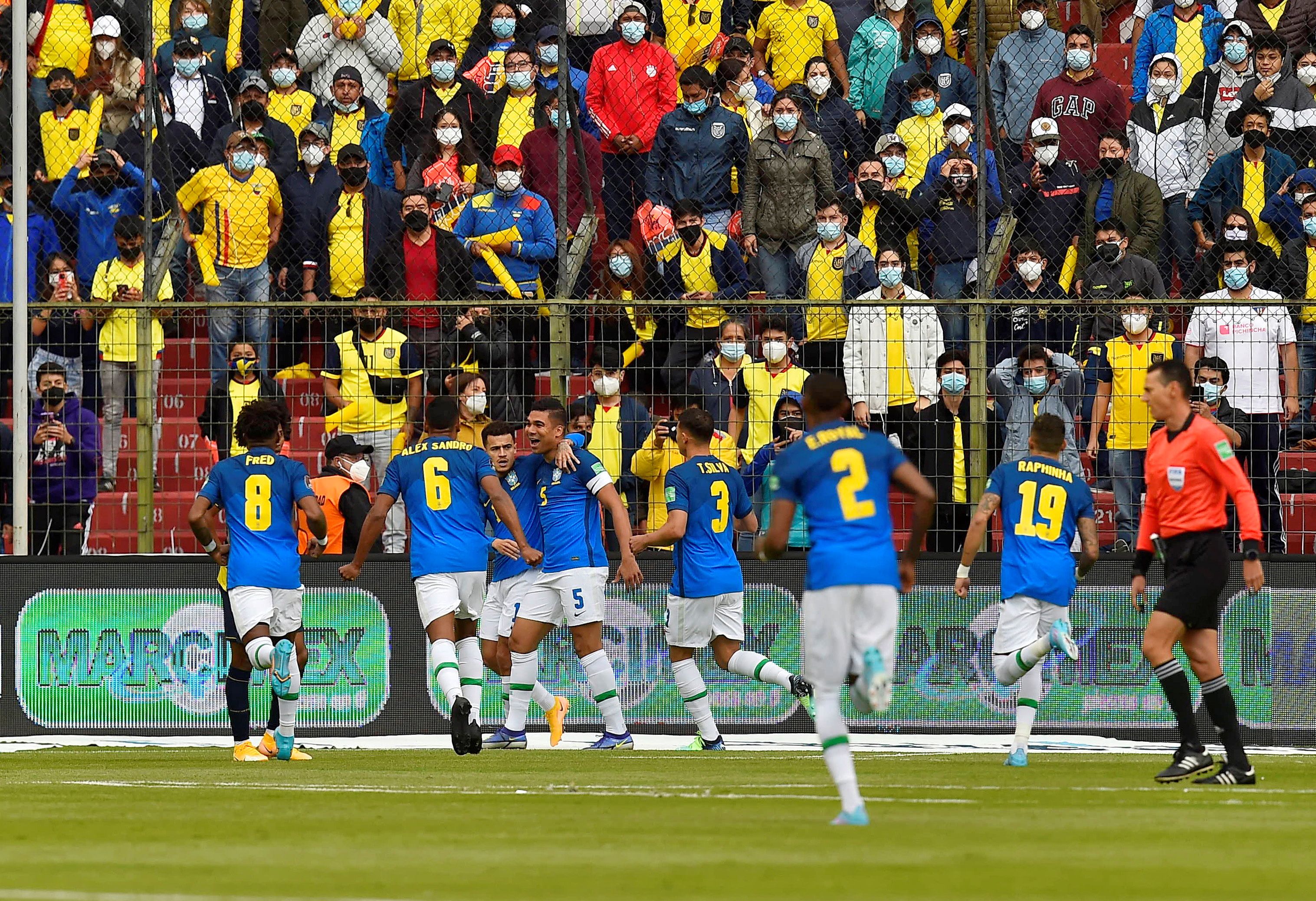 Brazil's Casemiro celebrates scoring their first goal with teammates