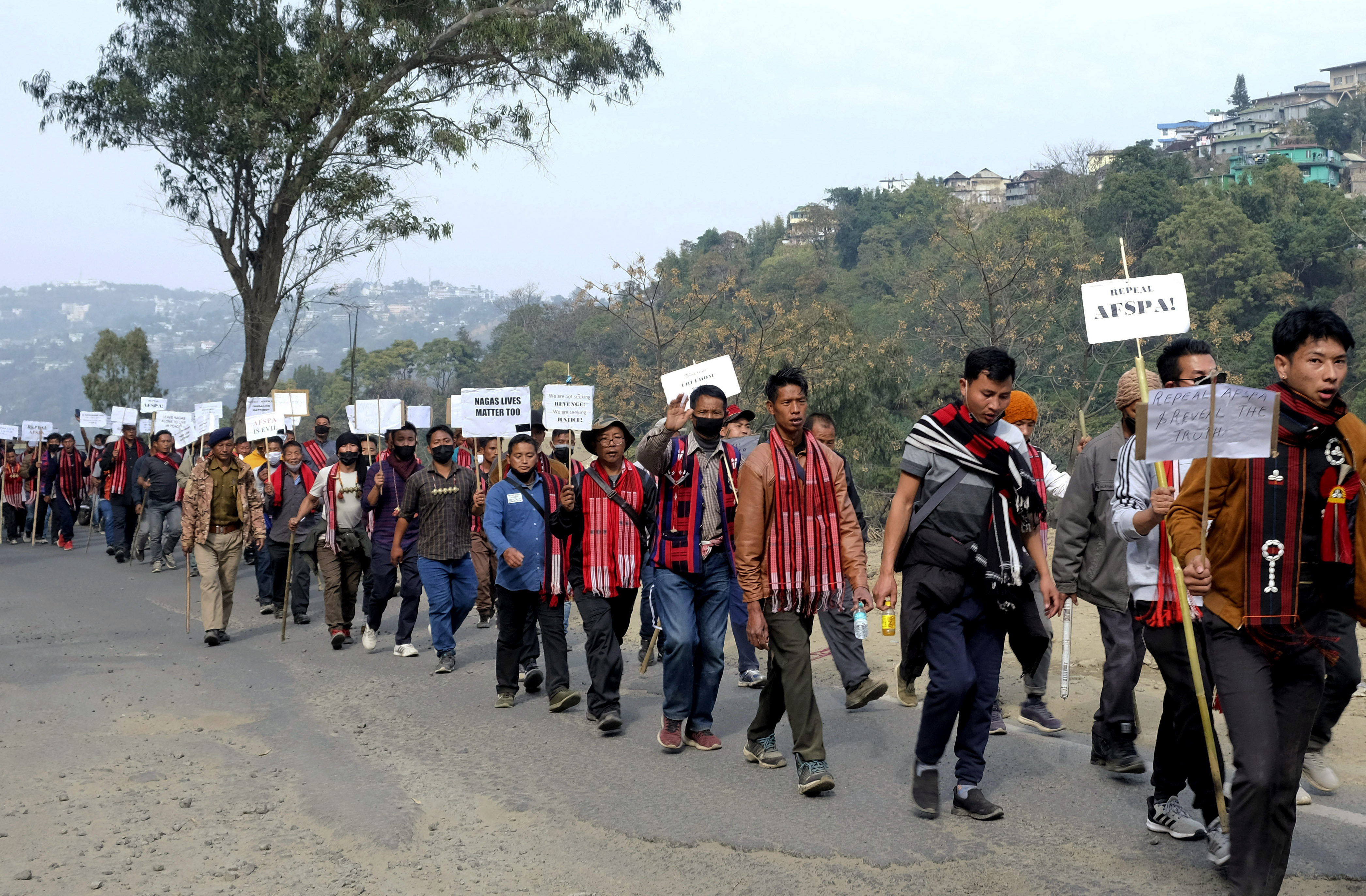 Nagas hold placards in Nagaland state, India