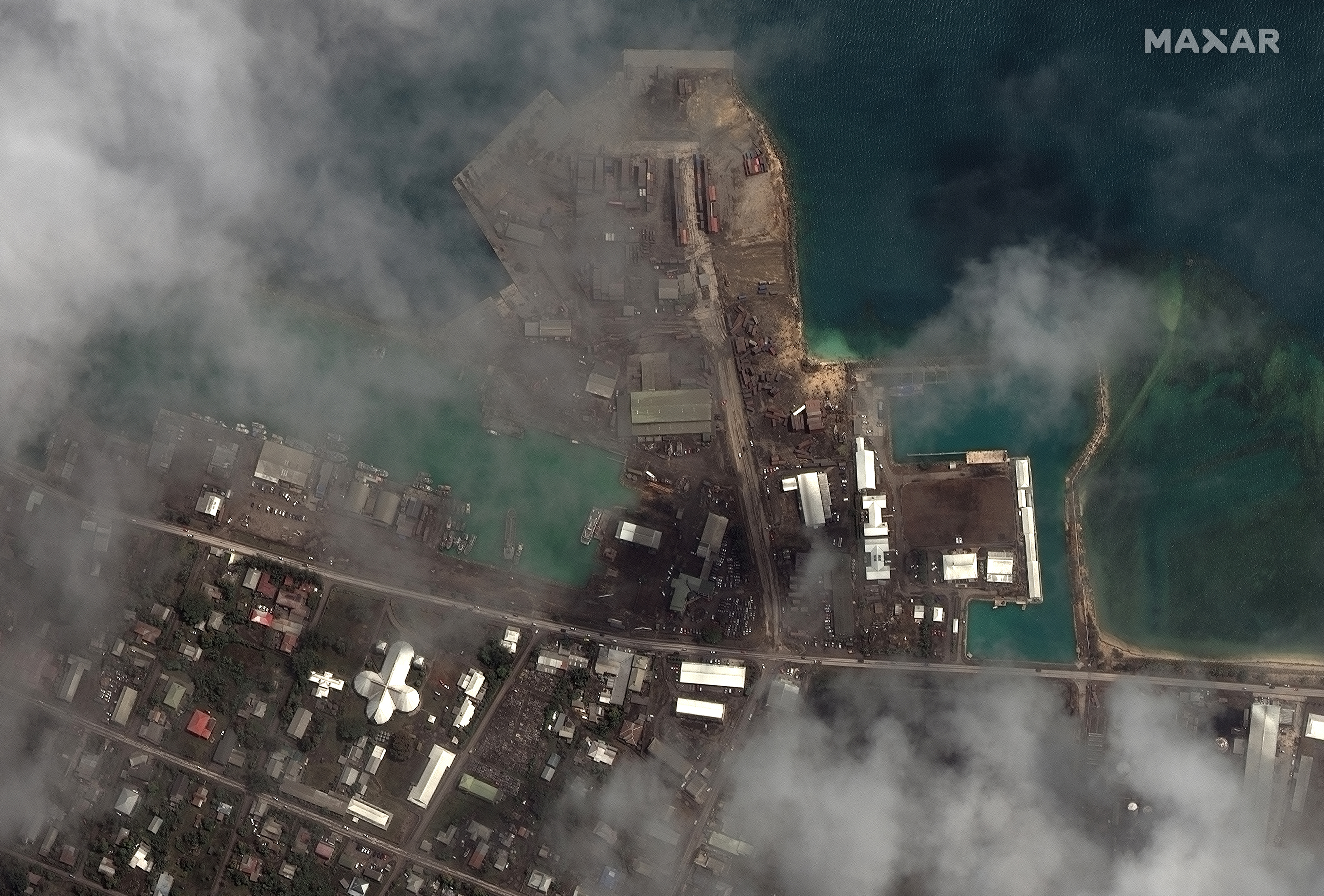 The main port facilities in Nuku’alofa, Tonga after a huge undersea volcanic eruption and tsunami.