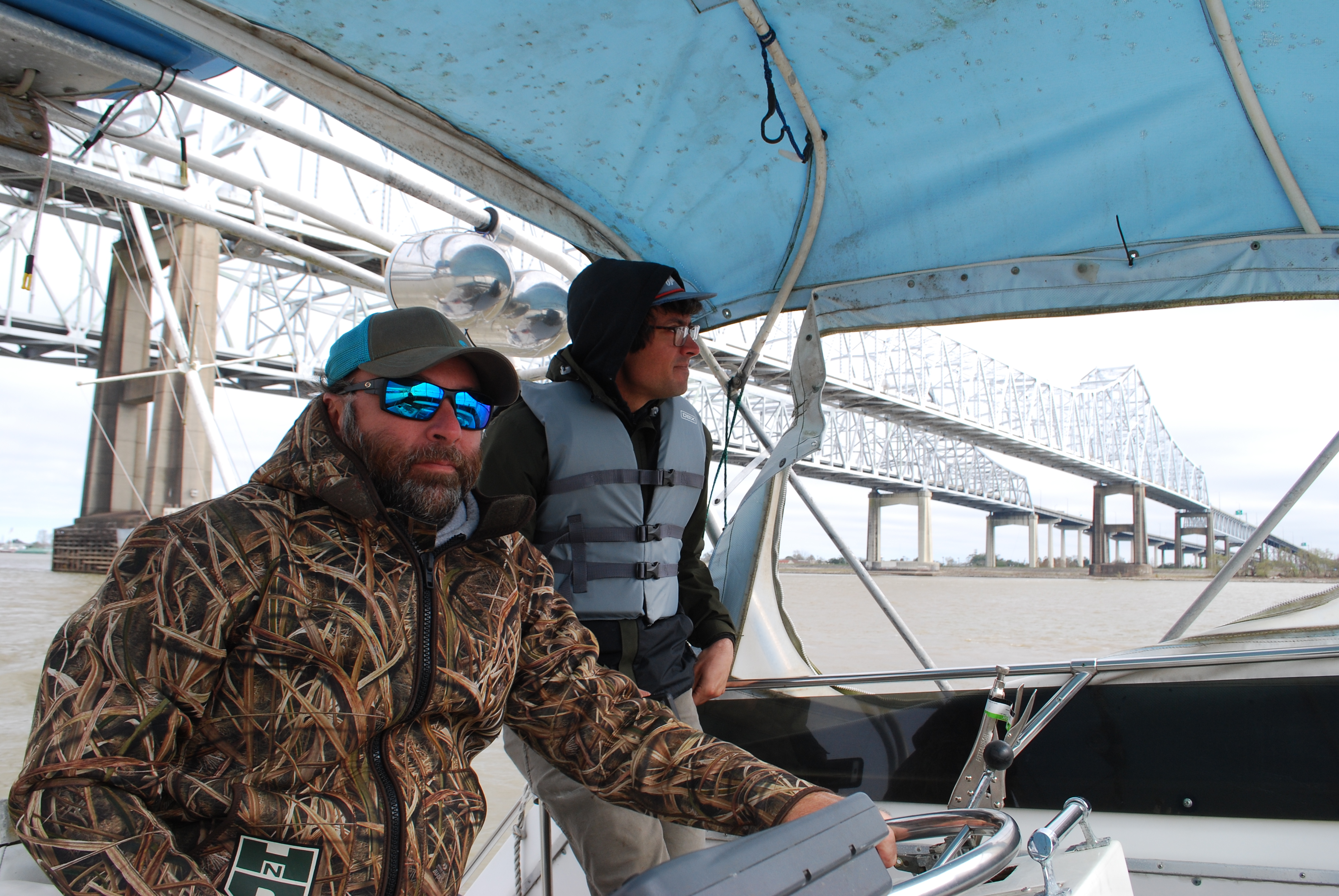An image of Maurer and Herring driving the boat.