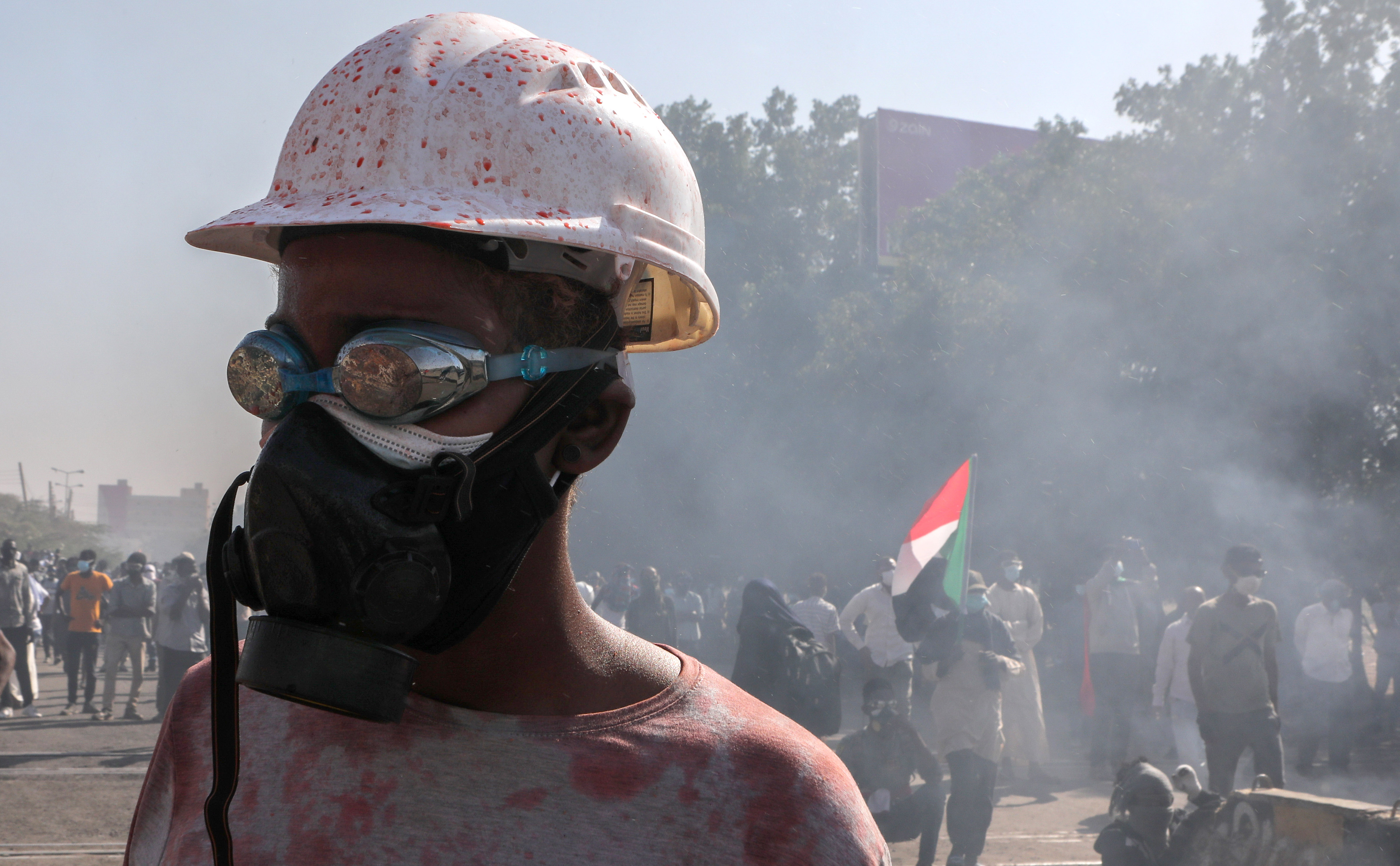 Sudanese protesters clash with security forces during a protest against military coup, in Khartoum, Sudan, 30 January 2022.
