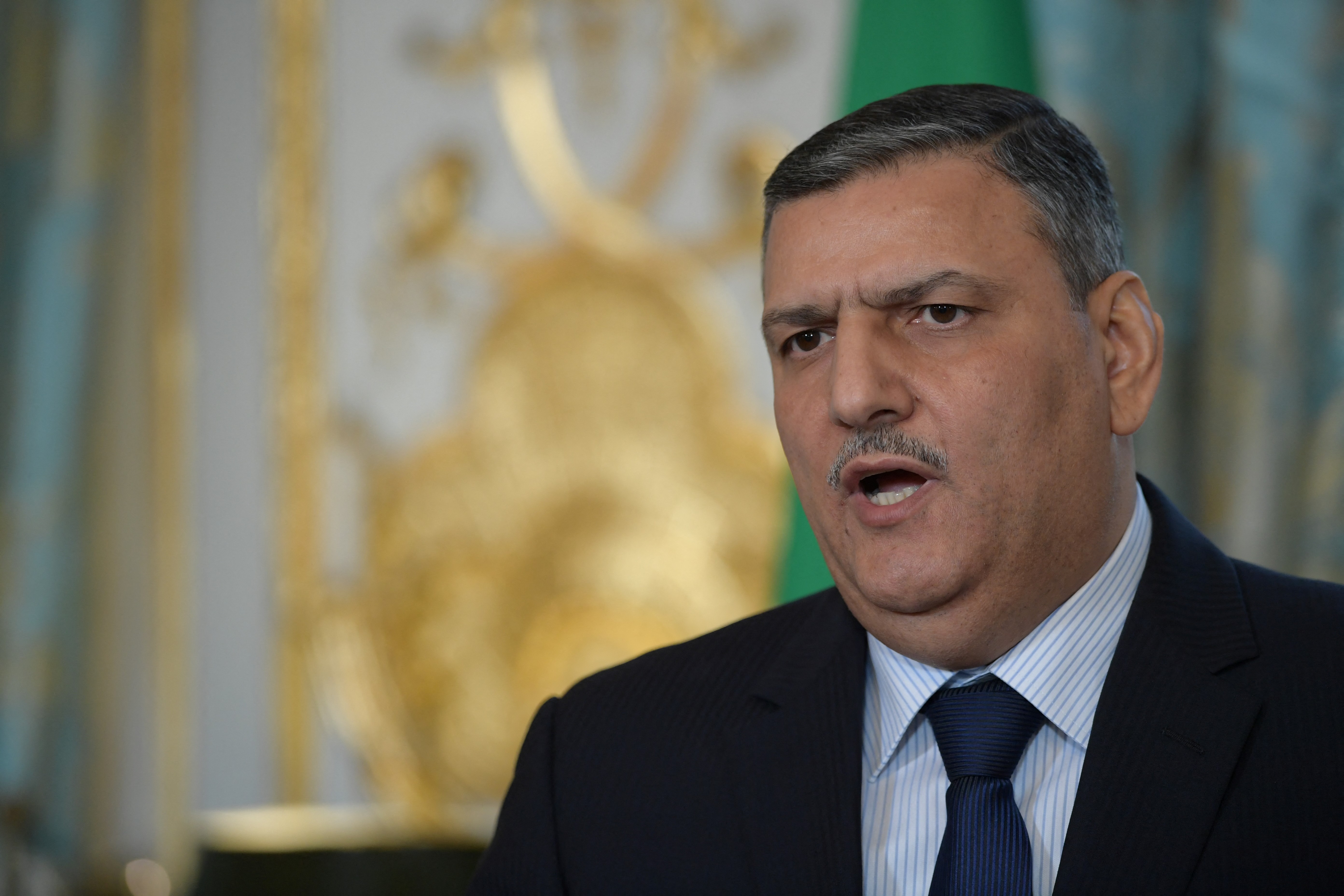 Riyad Hijab is seen talking