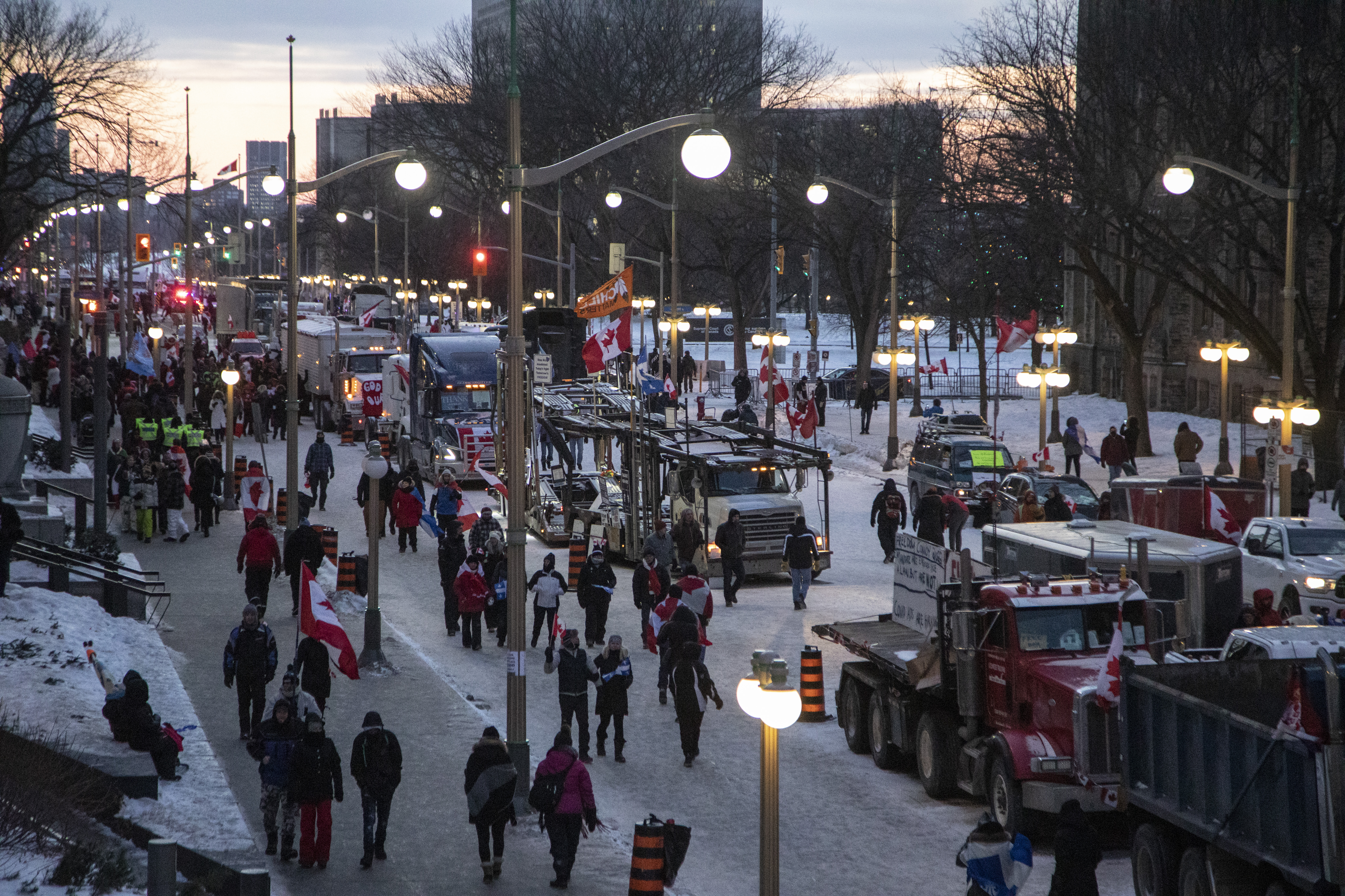 Protesters and trucks were massed on Wellington street in front of the Canadian Parliament Buildings