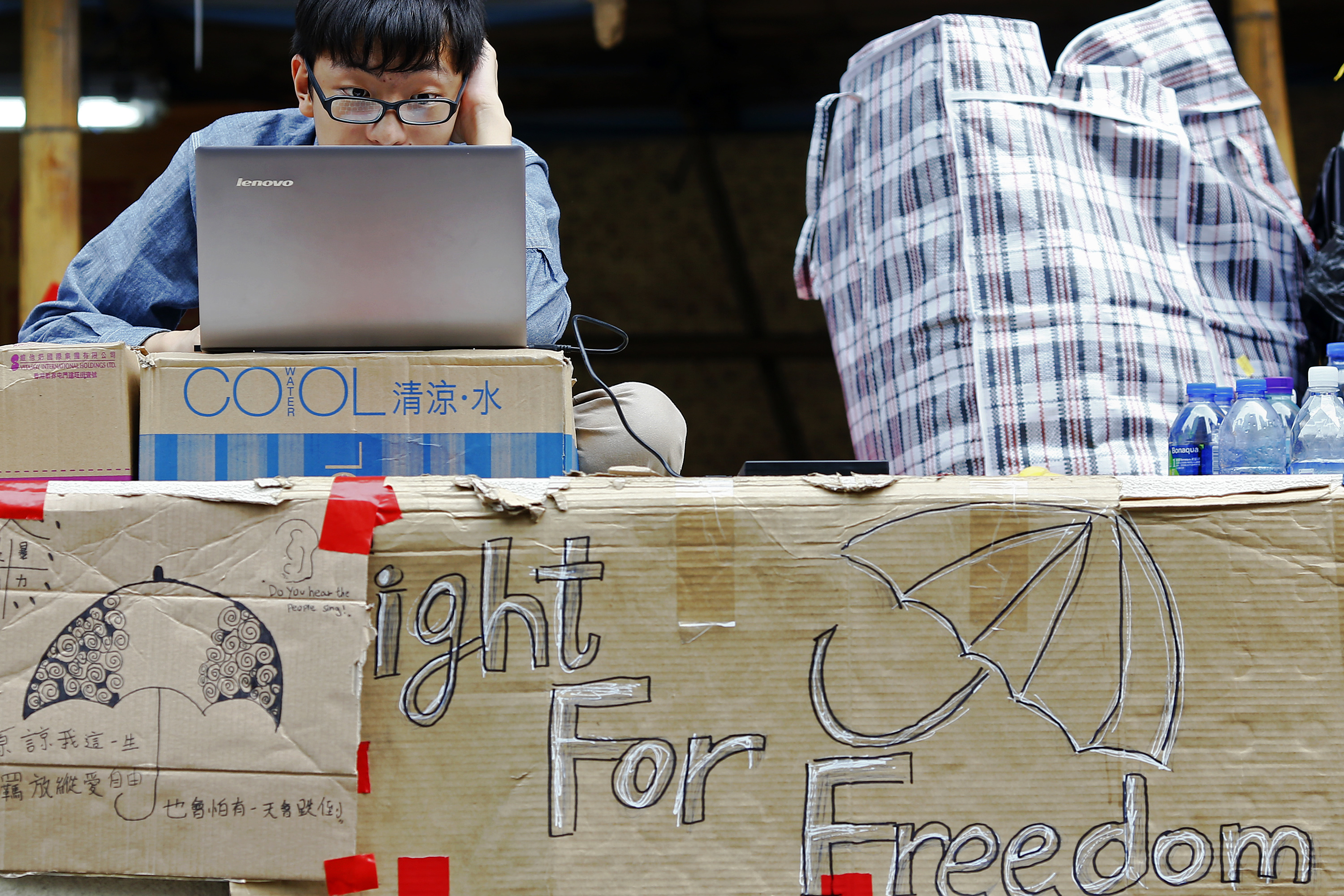 Mong kok boy uses computer