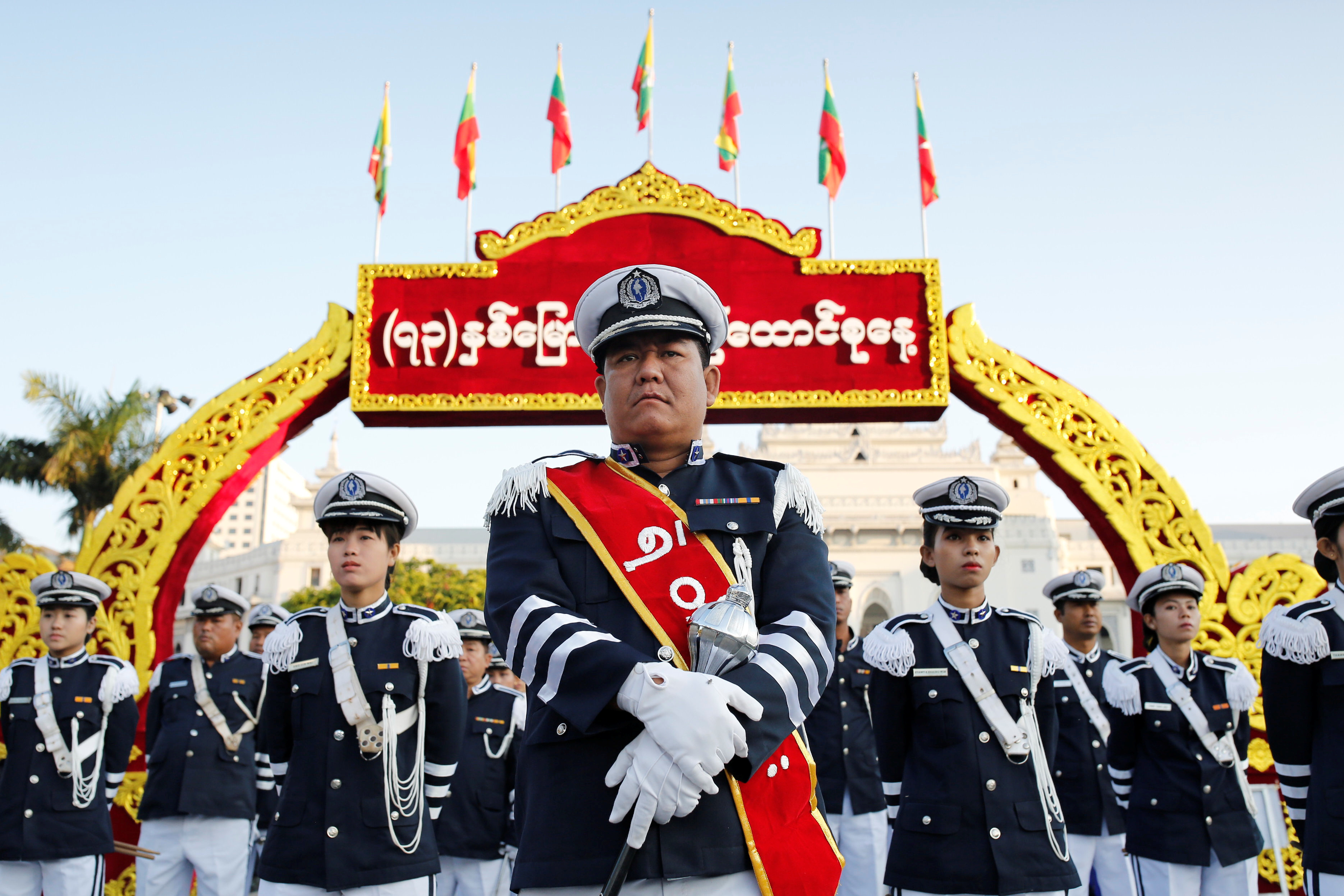 A marching band waits to perform during Union day celebrations in Yangon, Myanmar