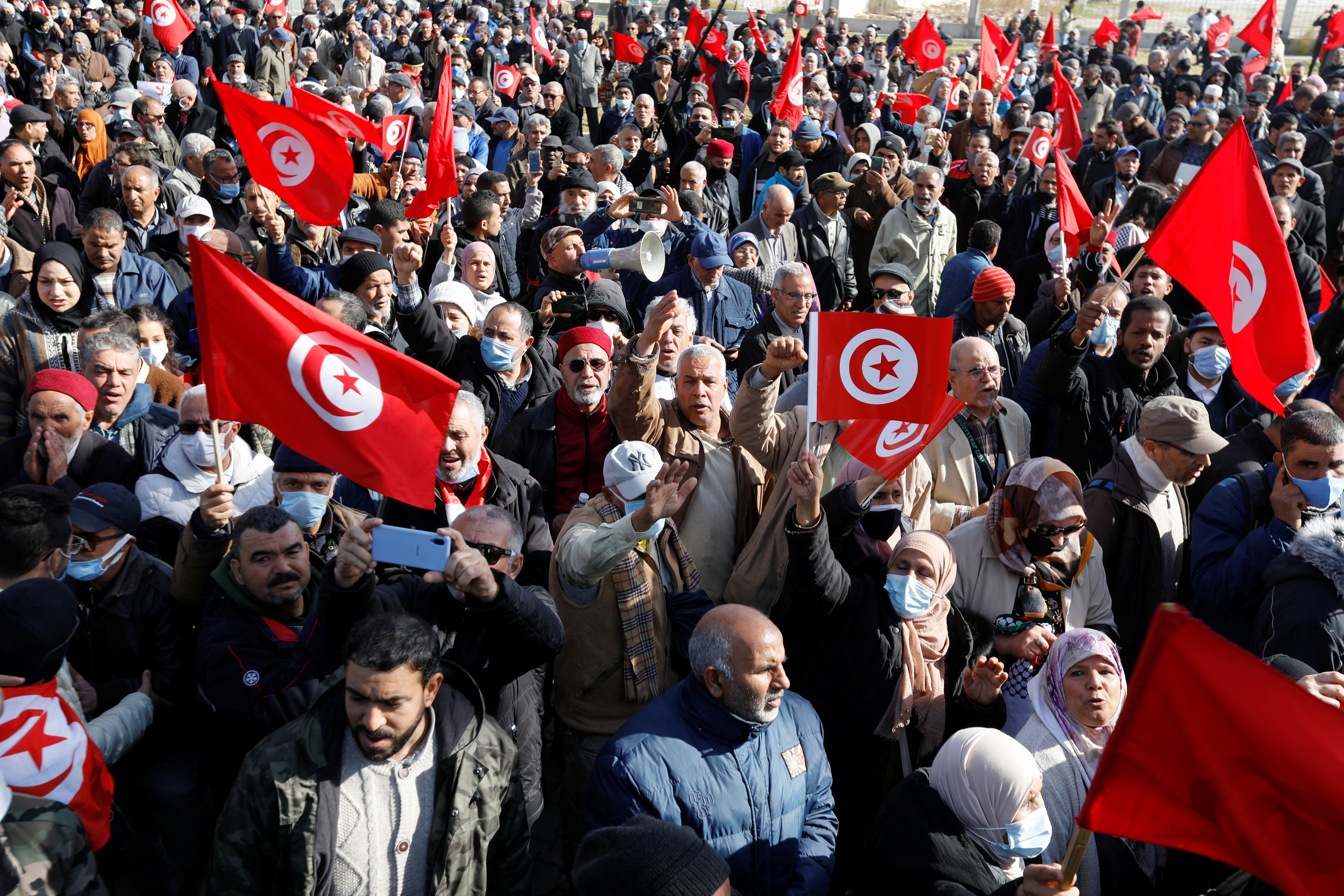 Demonstrators take part in a protest against Tunisian President Kais Saied's seizure of governing powers, in Tunis, Tunisia.