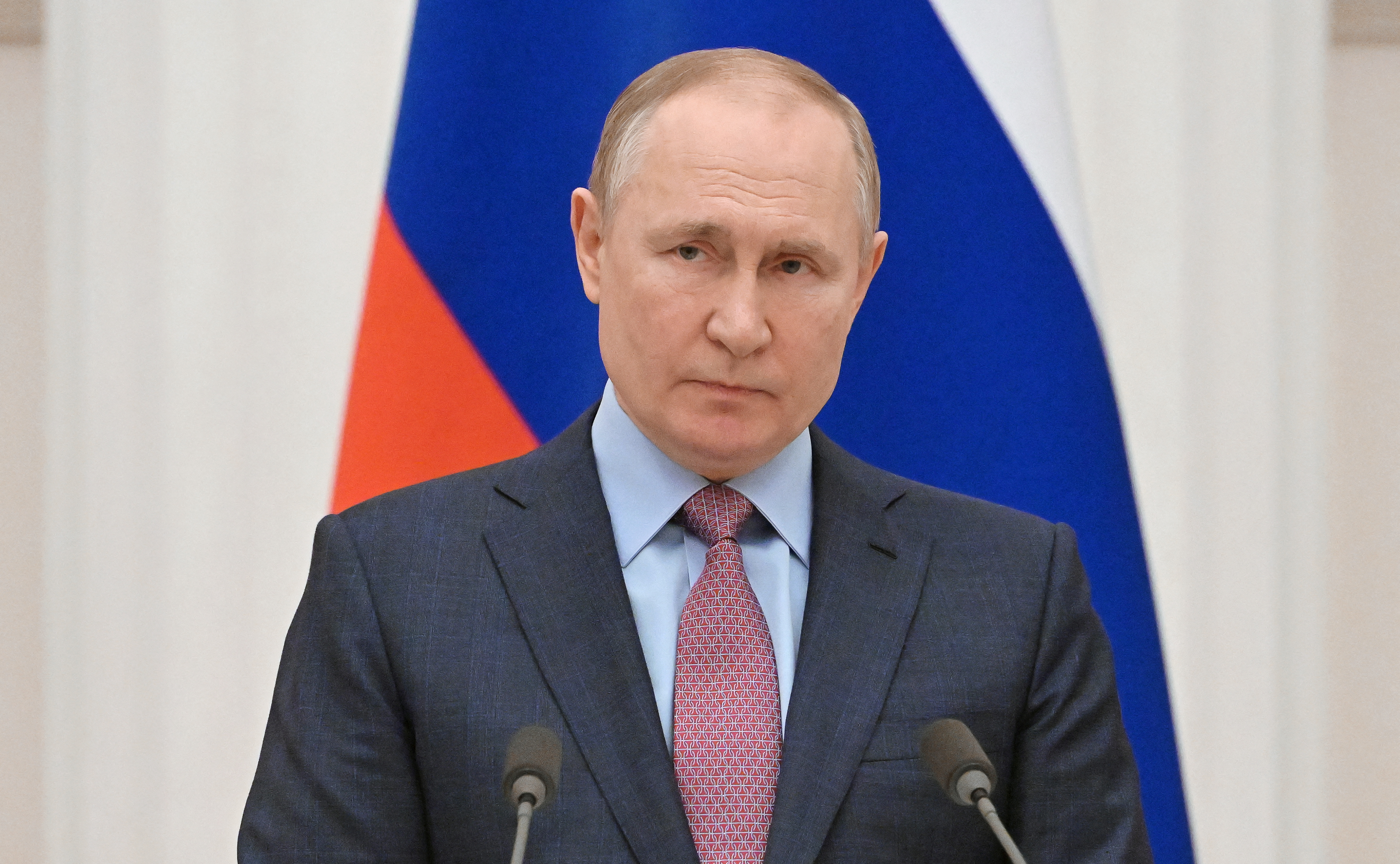 Russian President Vladimir Putin attends a joint news conference