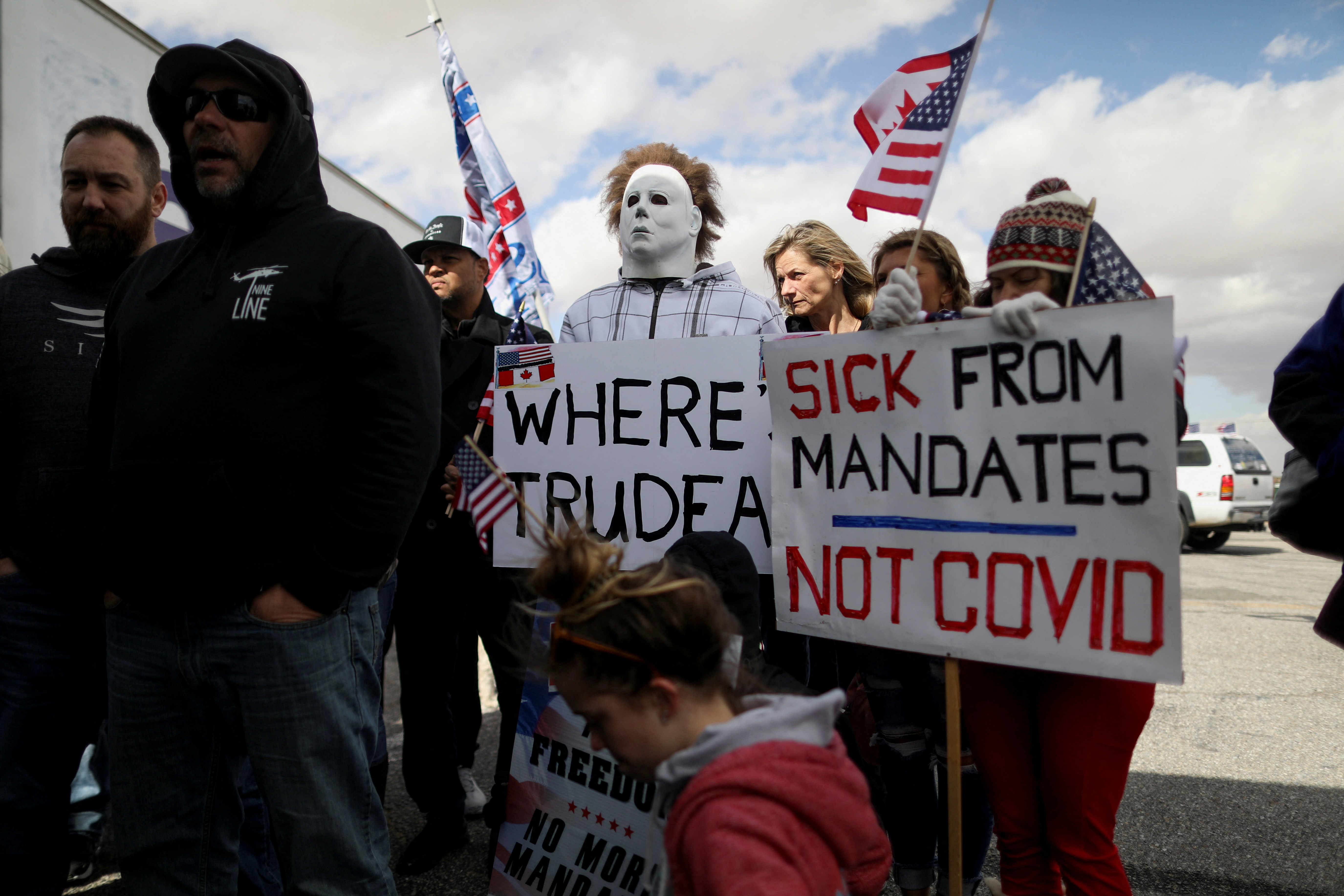 Truckers holding signs