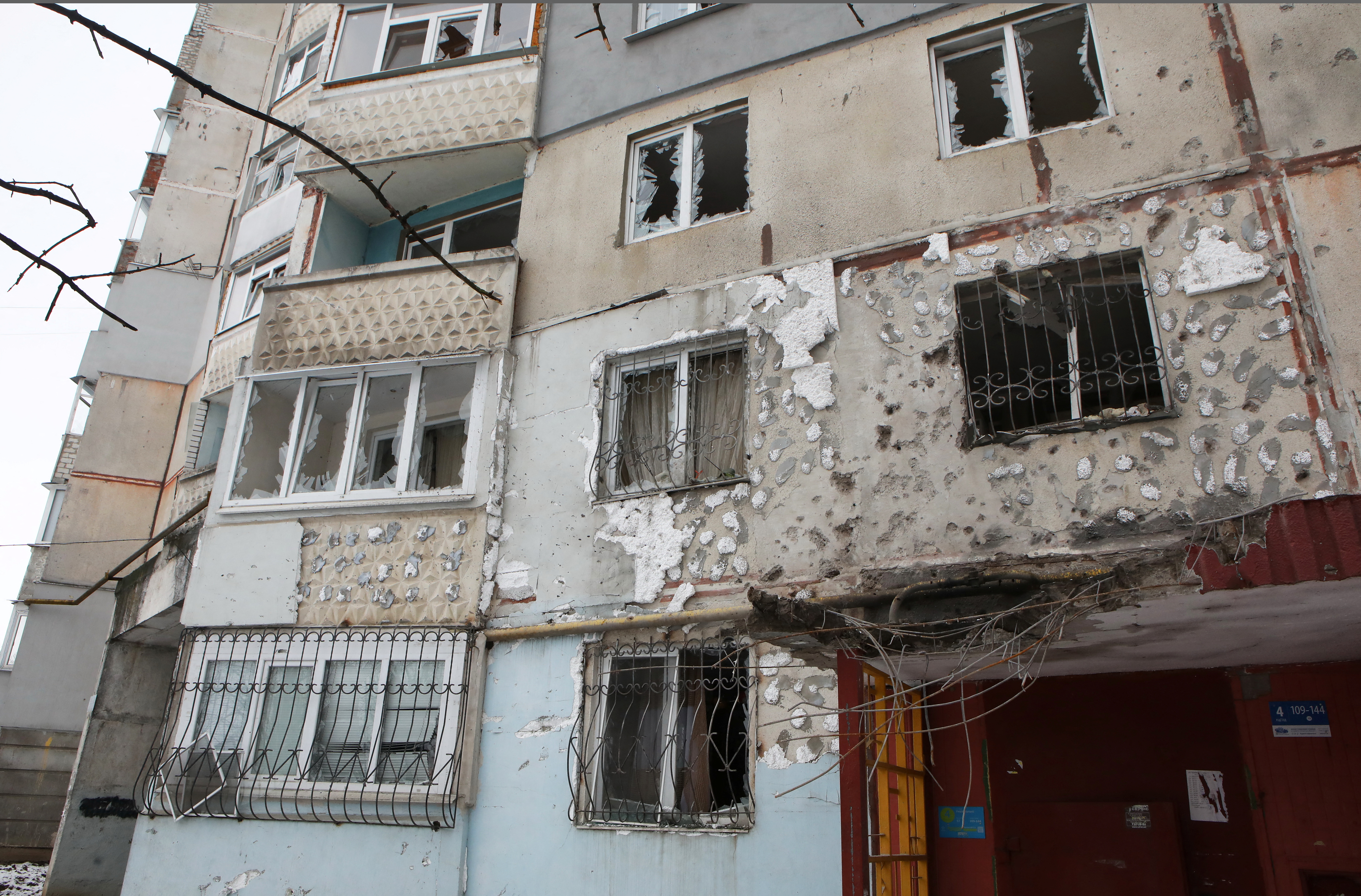 A damaged residential building in Kharkiv