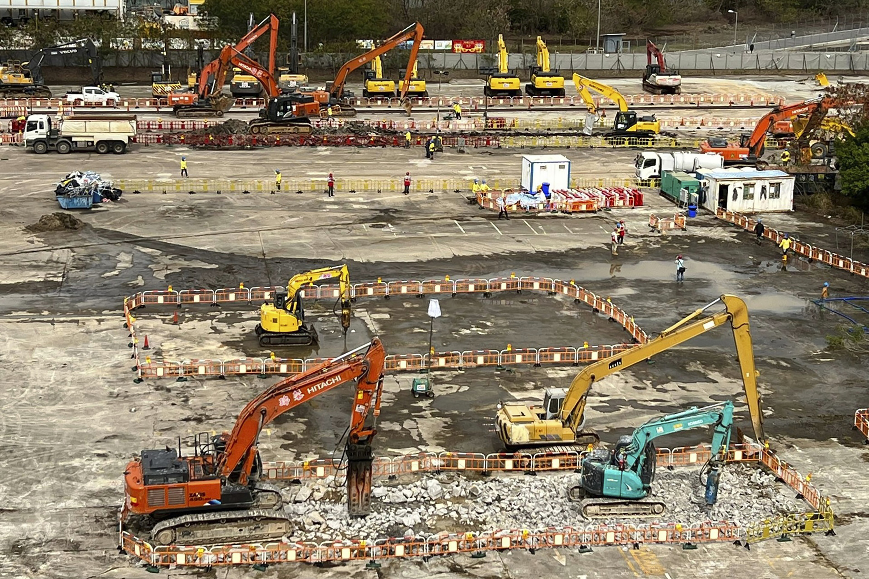 A construction site with diggers and foundations being built for a temporary medical facility in Hong Kong 