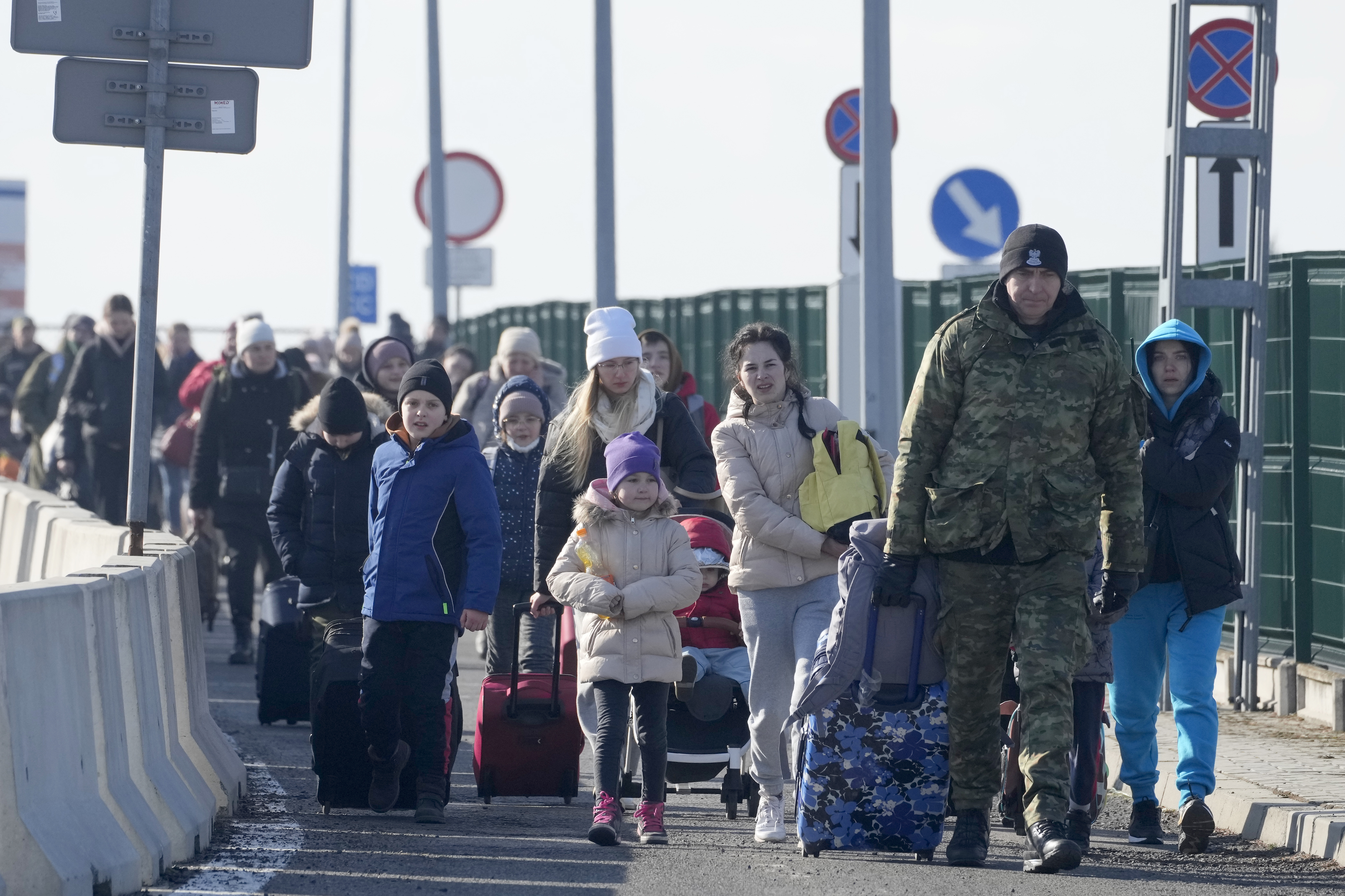 Ukrainian refugees seen as they cross the Polish border