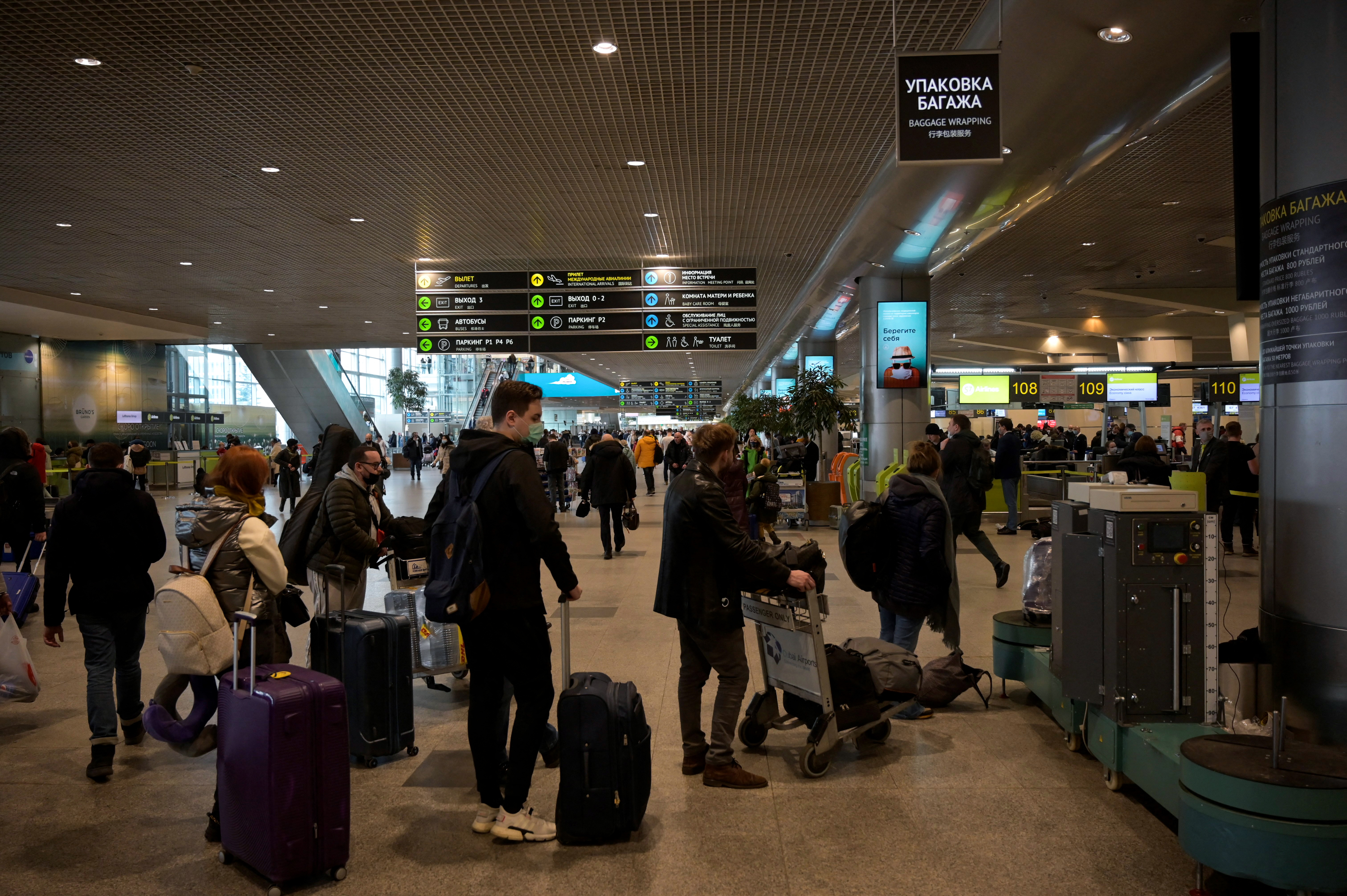 Passengers are seen at Moscow's Domodedovo airport