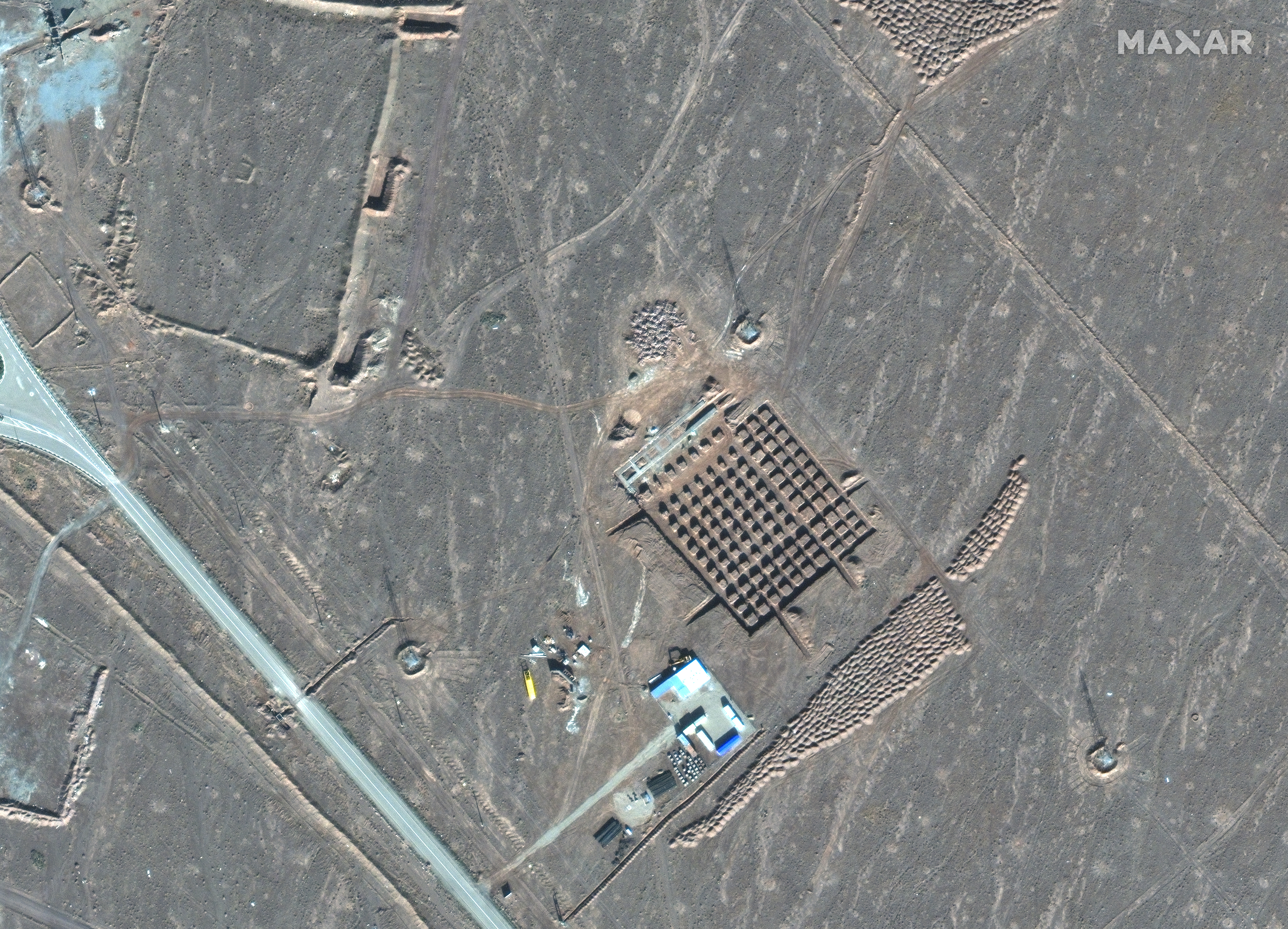 This handout satellite image provided by Maxar Technologies shows an overview of Iran’s Fordow Fuel Enrichment Plant (FFEP), northeast of the Iranian city of Qom