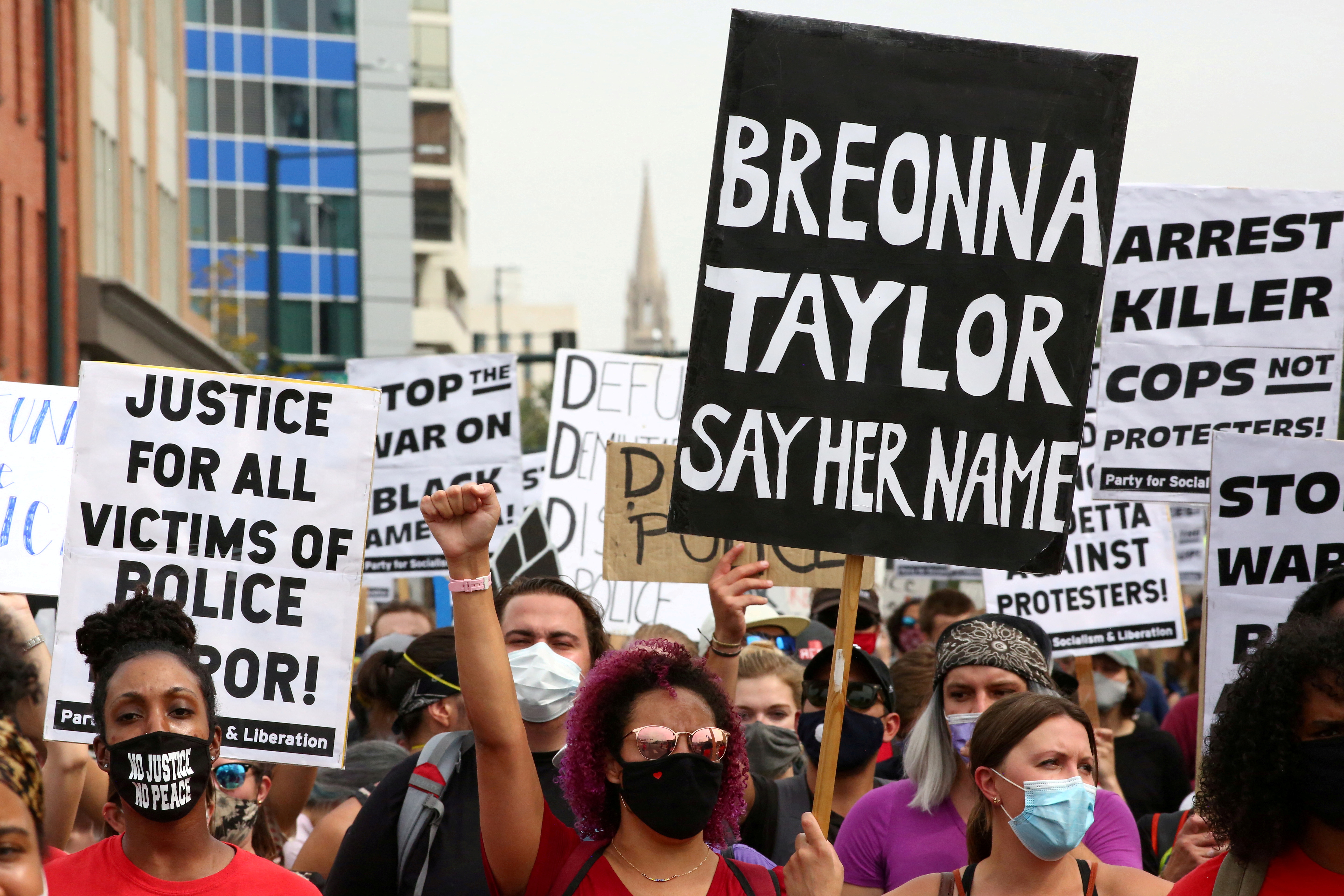 Protesters march against racial injustice and for Black women following the grand jury decision in Louisville's Breonna Taylor case, in Denver, Colorado.