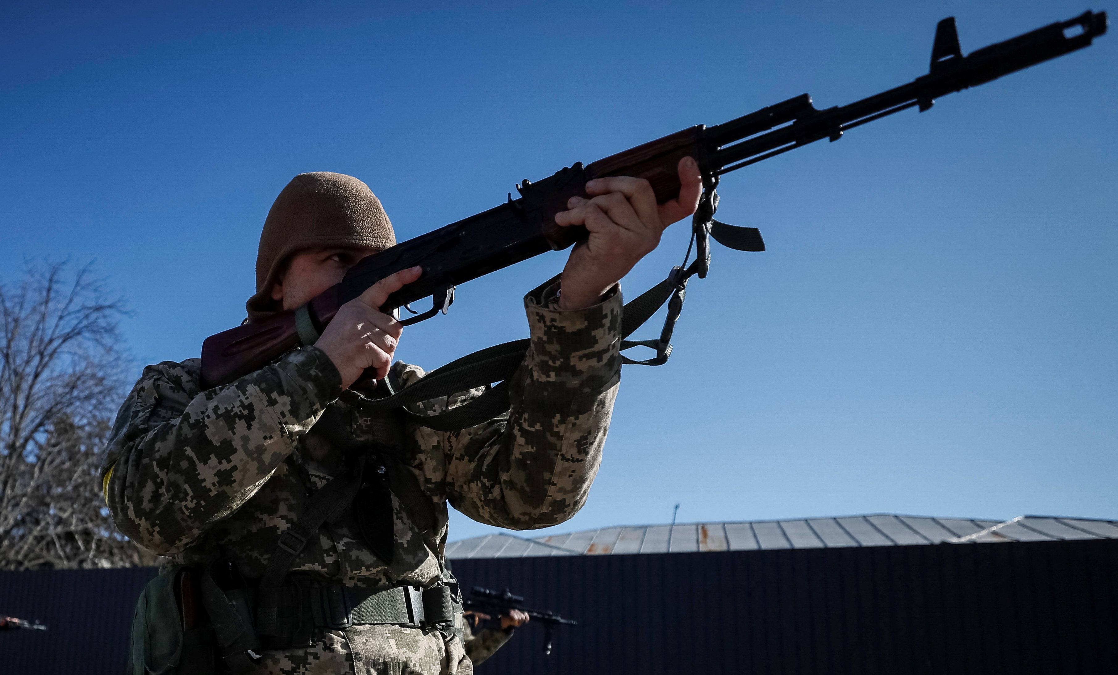 New members of the Ukrainian Territorial Defence Forces train with newly received weapons
