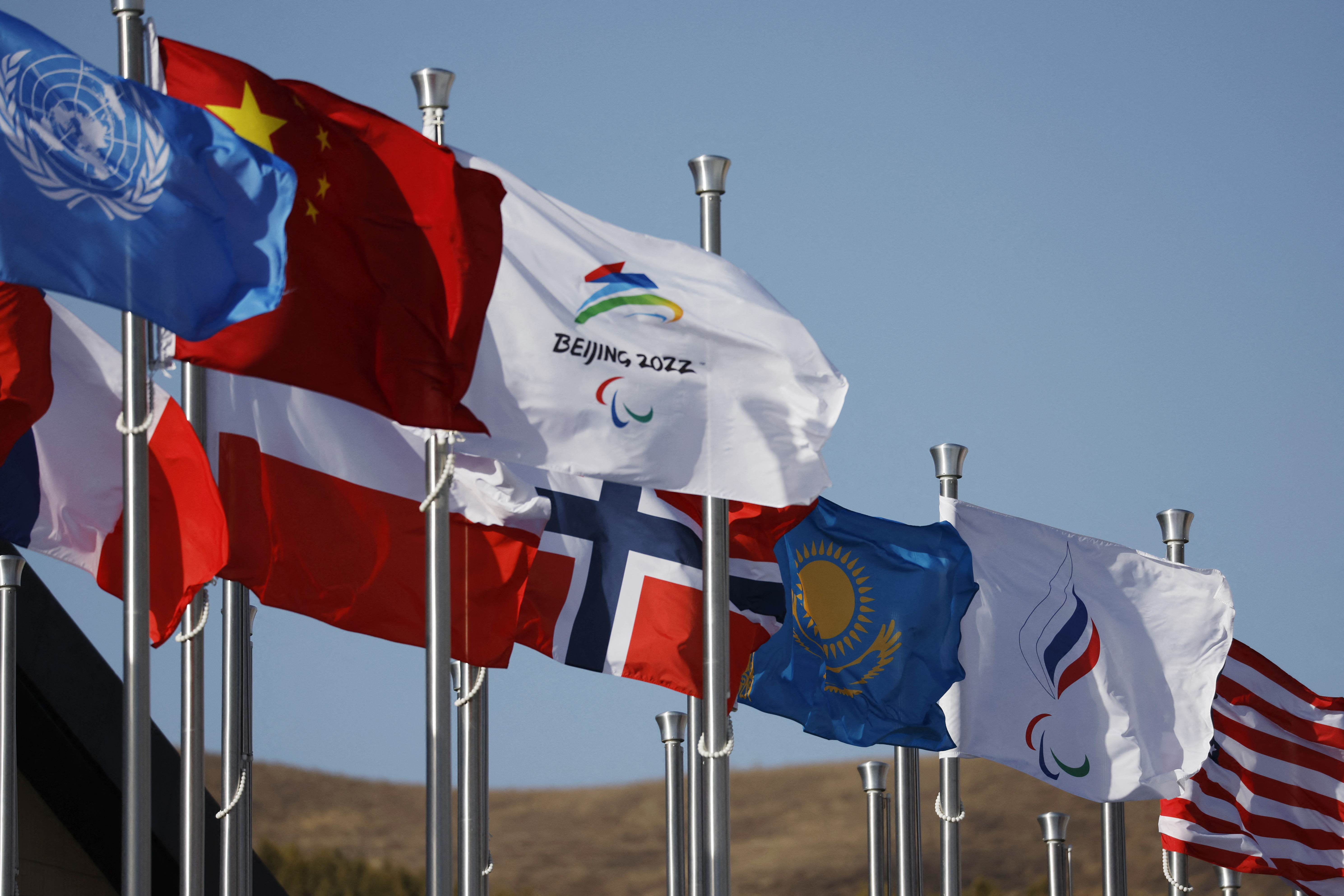 Beijing 2022 Winter Paralympic Games - Beijing 2022 Winter Paralympic Games Preview - Zhangjiakou, China - March 3, 2022. The flag of the Russian Paralympic Committee is seen with the Beijing 2022 flag and national flags of countries taking part in the Beijing 2022 Winter Paralympic Games REUTERS/Issei Kato