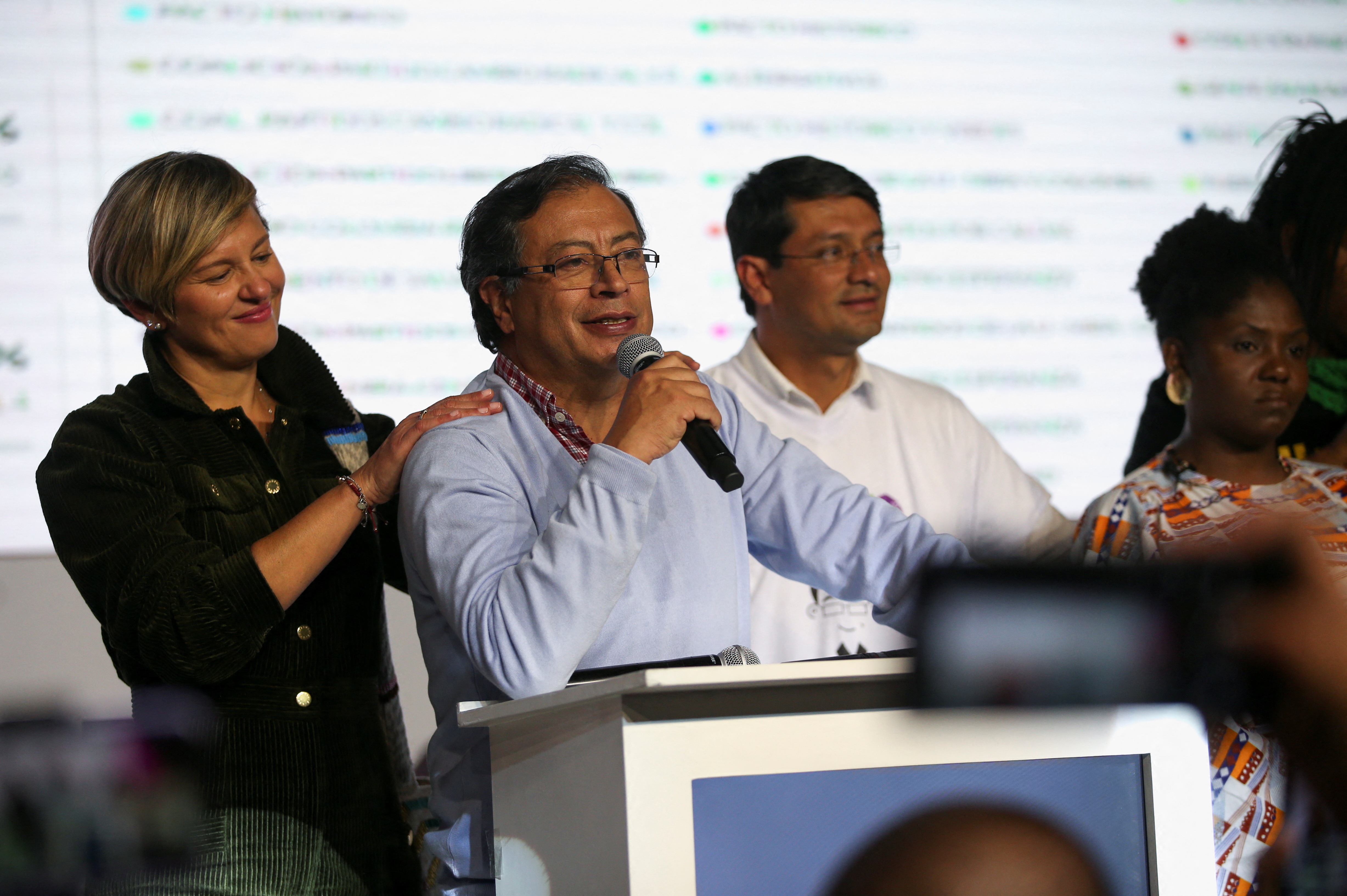 Colombia's presidential candidate Gustavo Petro speaking at podium