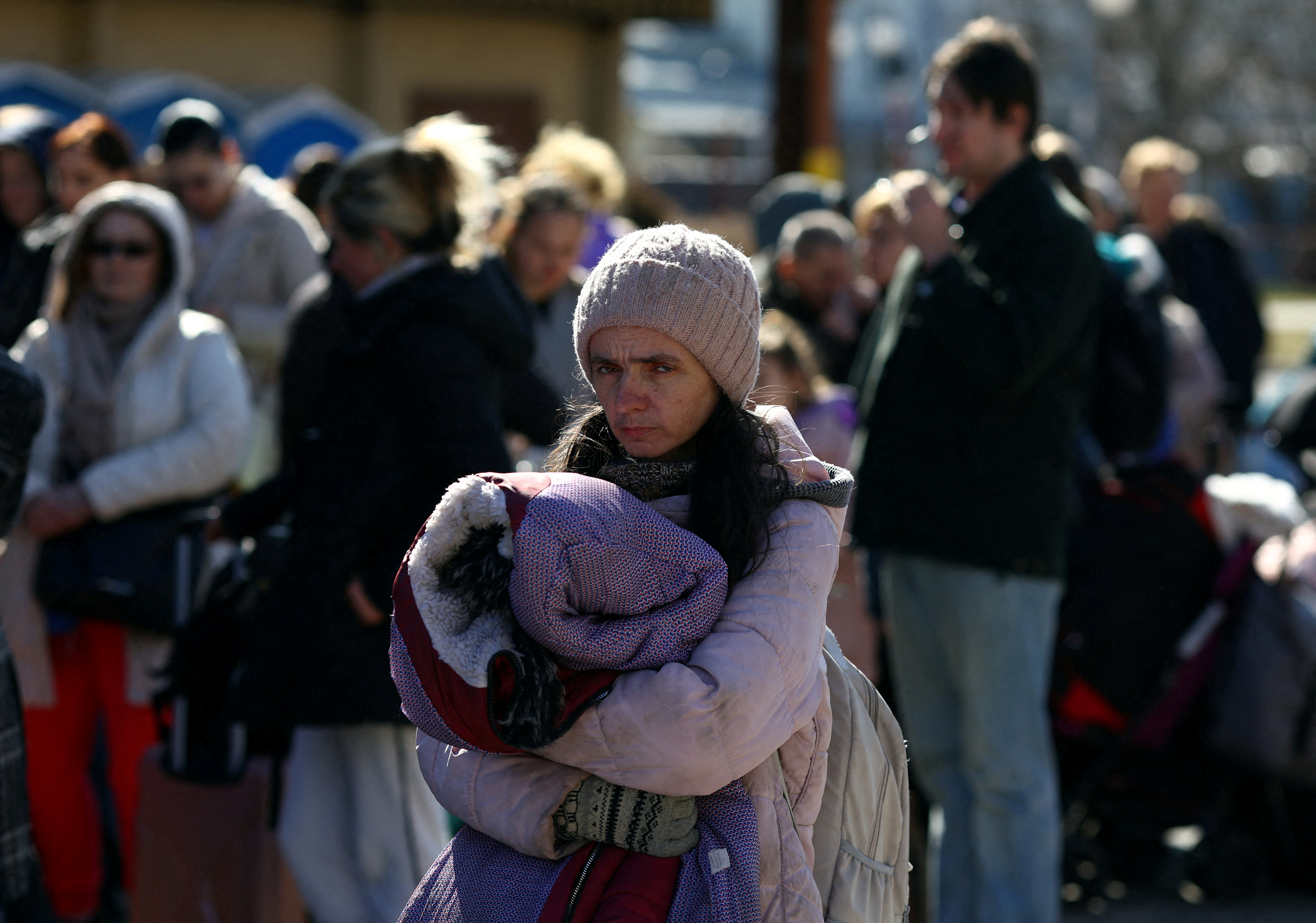 Ukrainian refugees in Poland wait to board a train back to the Ukraine outside of Przemysl Glowny train station, after fleeing the Russian invasion of Ukraine.